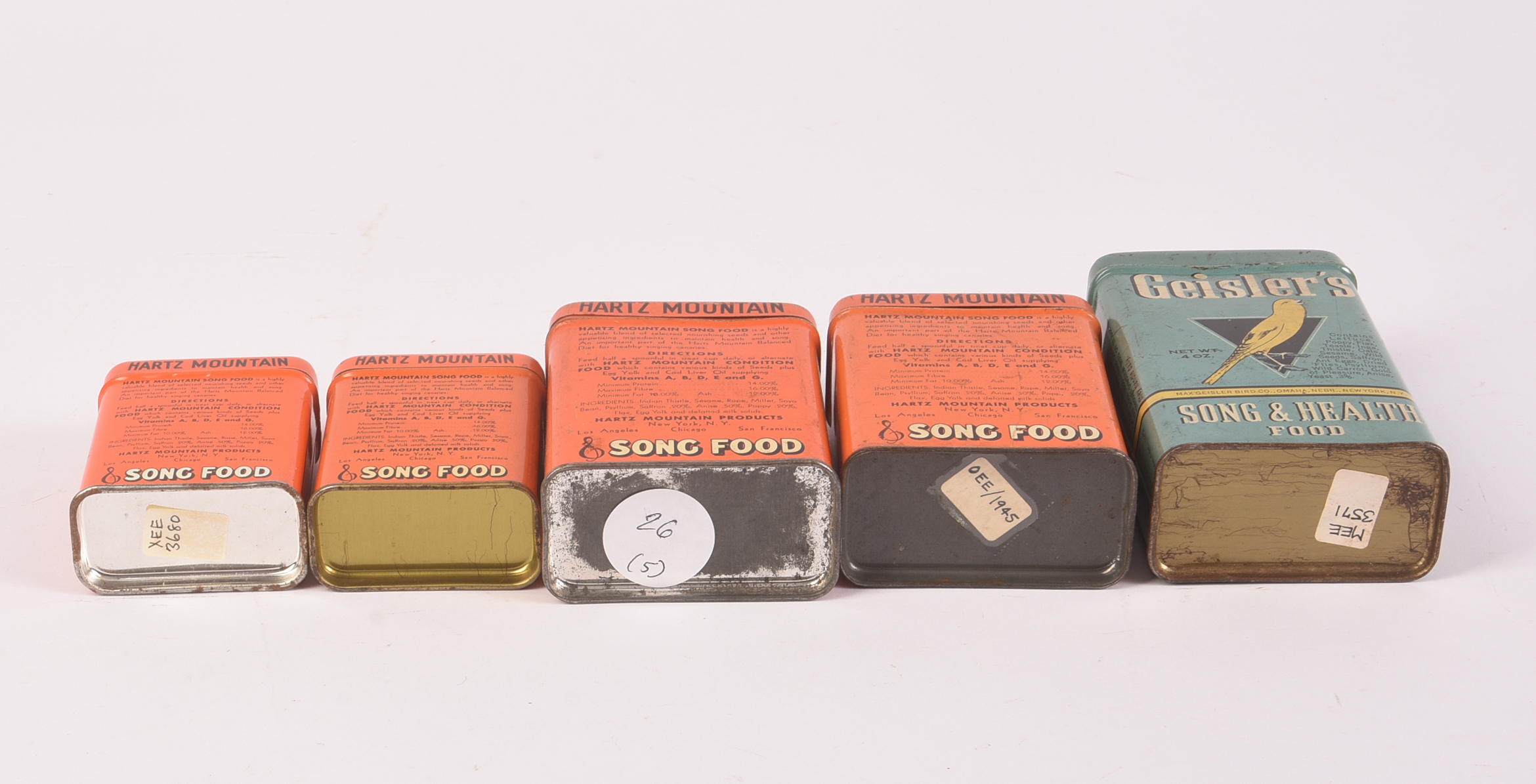 Five Vintage Bird Food Tins.