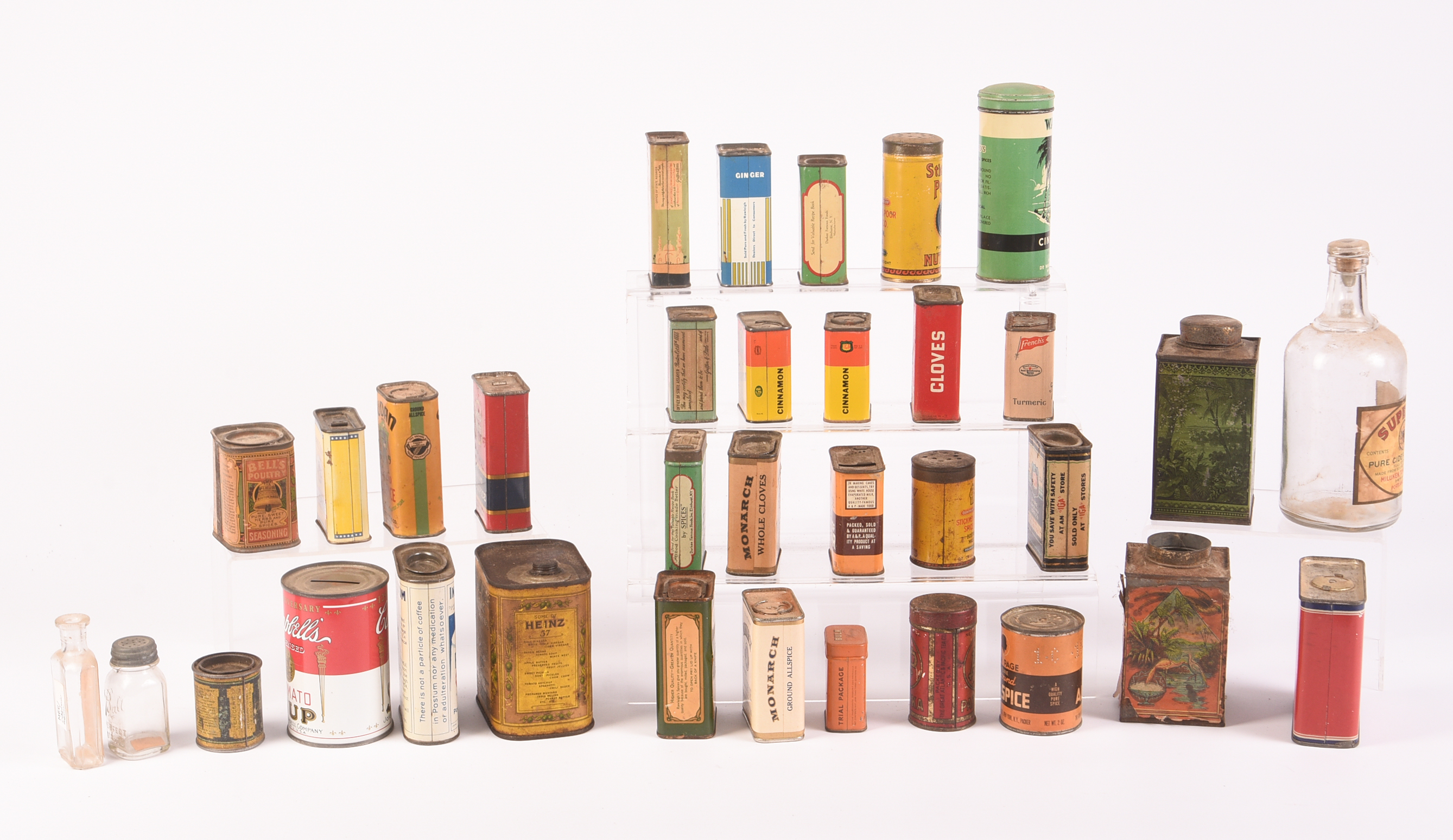 Large Grouping of Spice Tins and Related Containers.