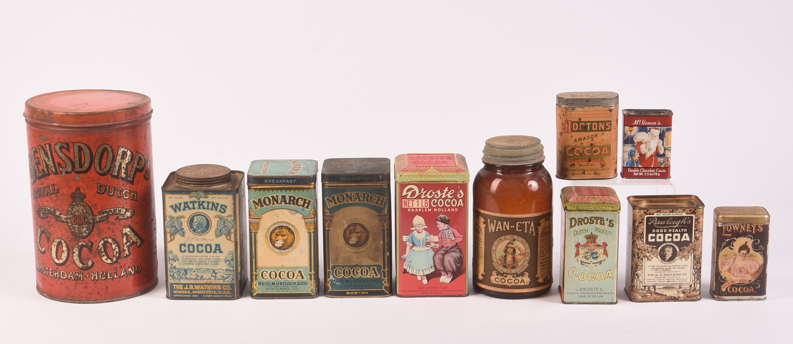 Ten Cocoa Vintage Tins and a Jar.