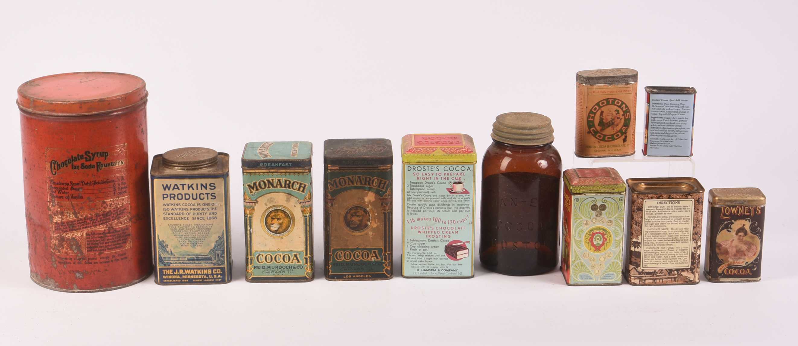 Ten Cocoa Vintage Tins and a Jar.