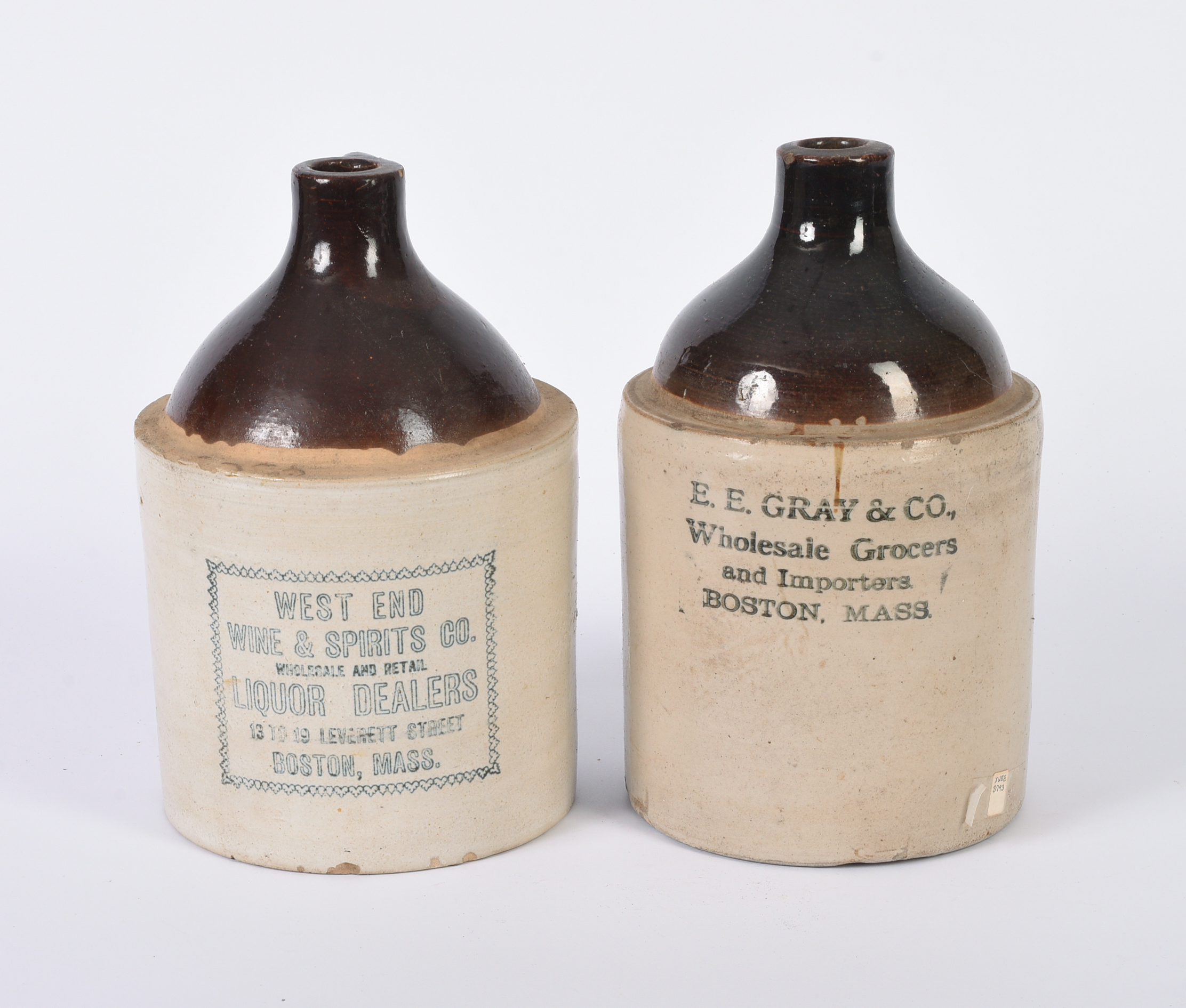 Two Stoneware Merchant Jugs.