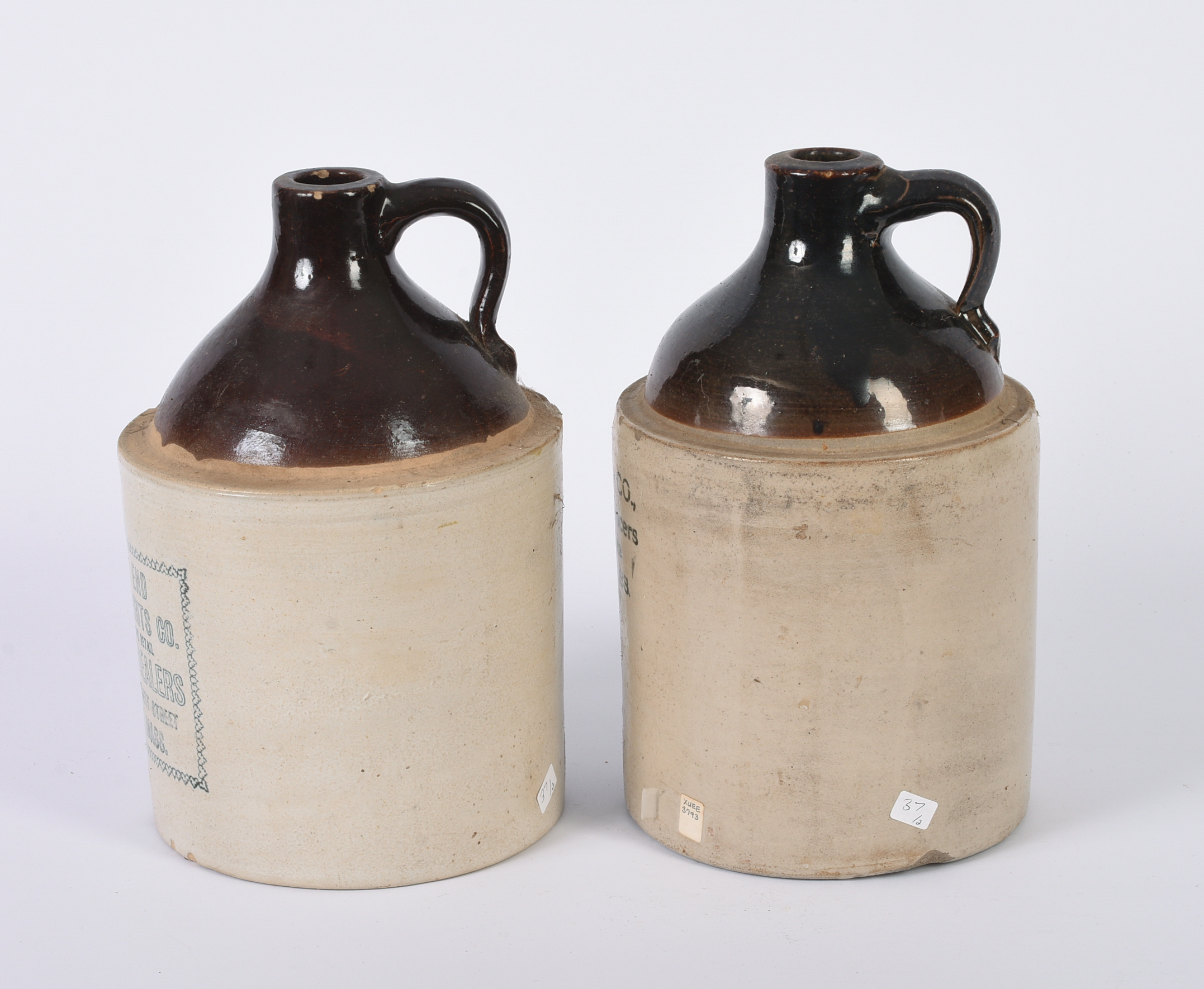 Two Stoneware Merchant Jugs.