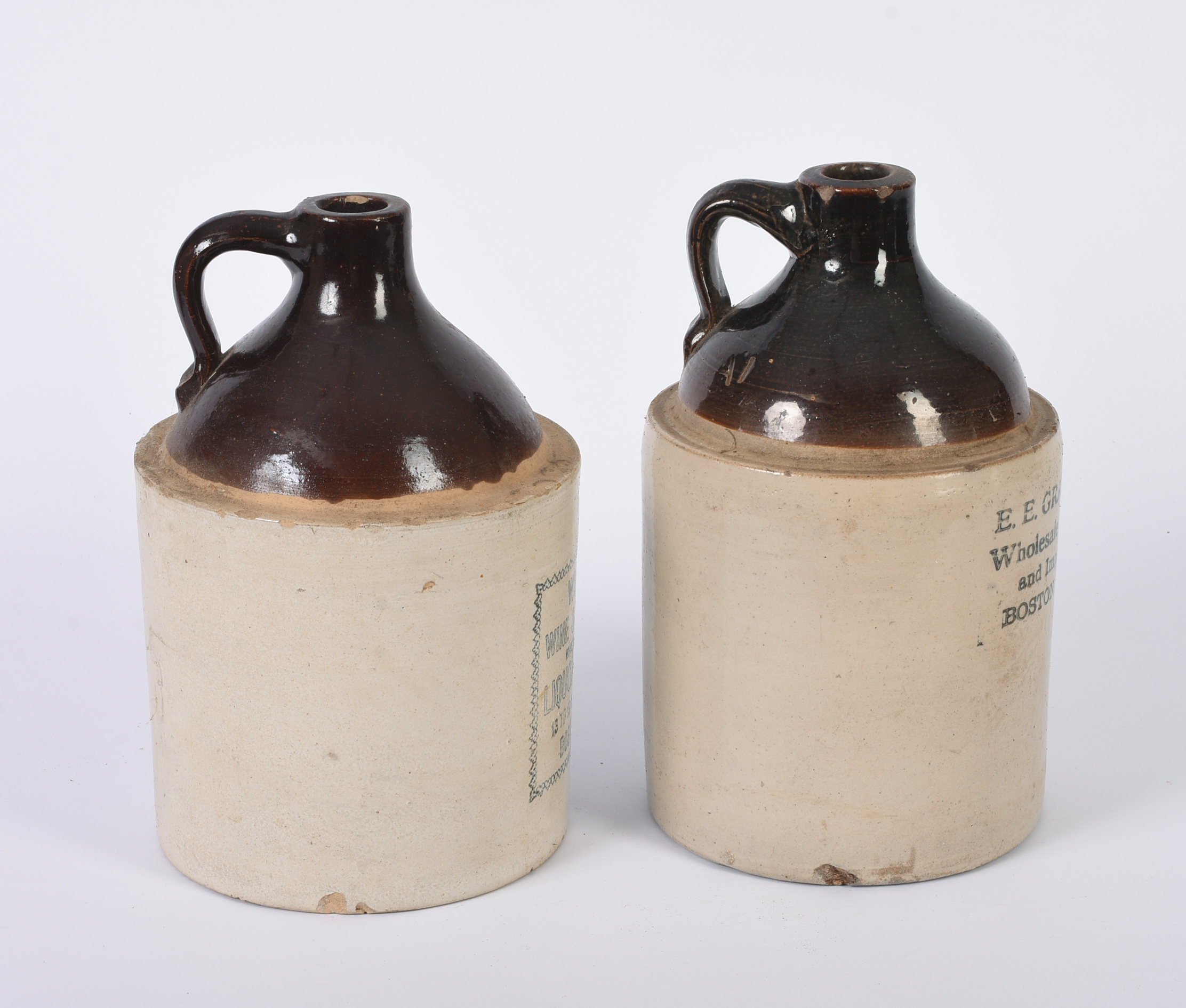 Two Stoneware Merchant Jugs.