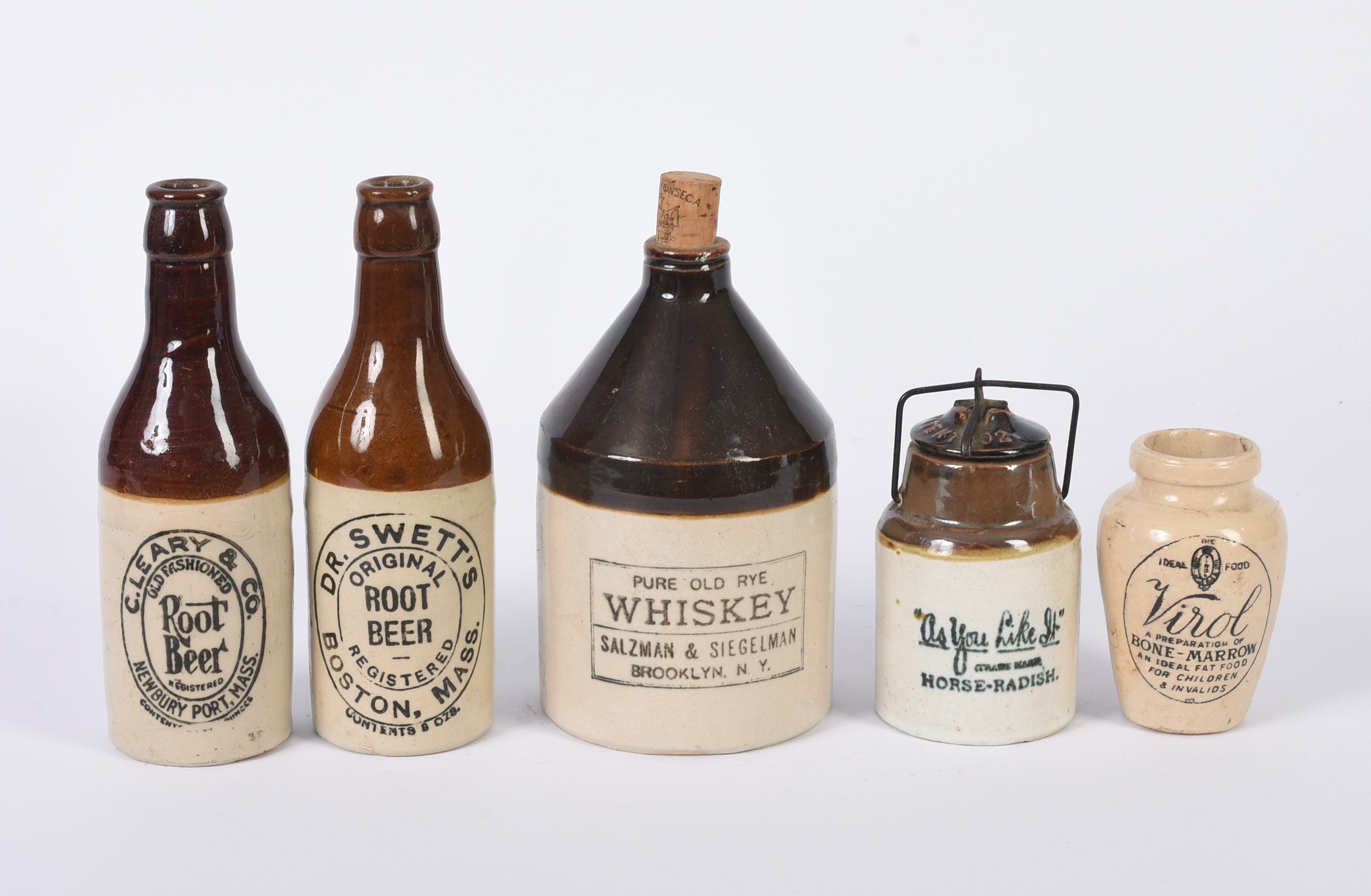 Five Small Stoneware Jars, Bottles, and a Jug.