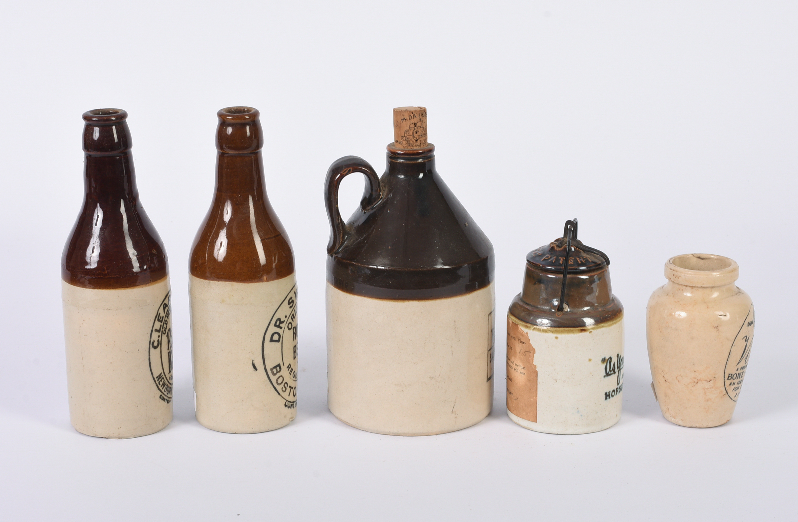 Five Small Stoneware Jars, Bottles, and a Jug.