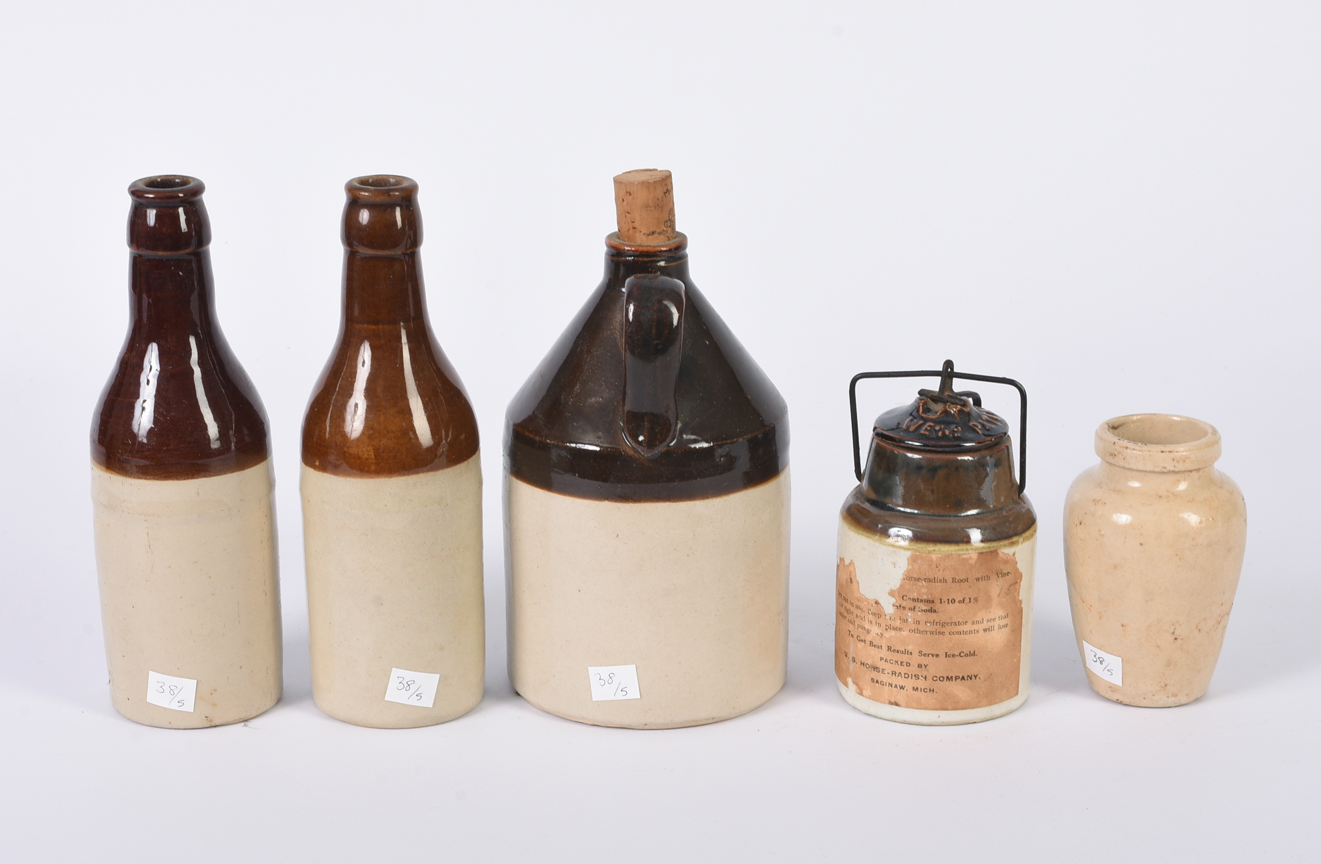Five Small Stoneware Jars, Bottles, and a Jug.