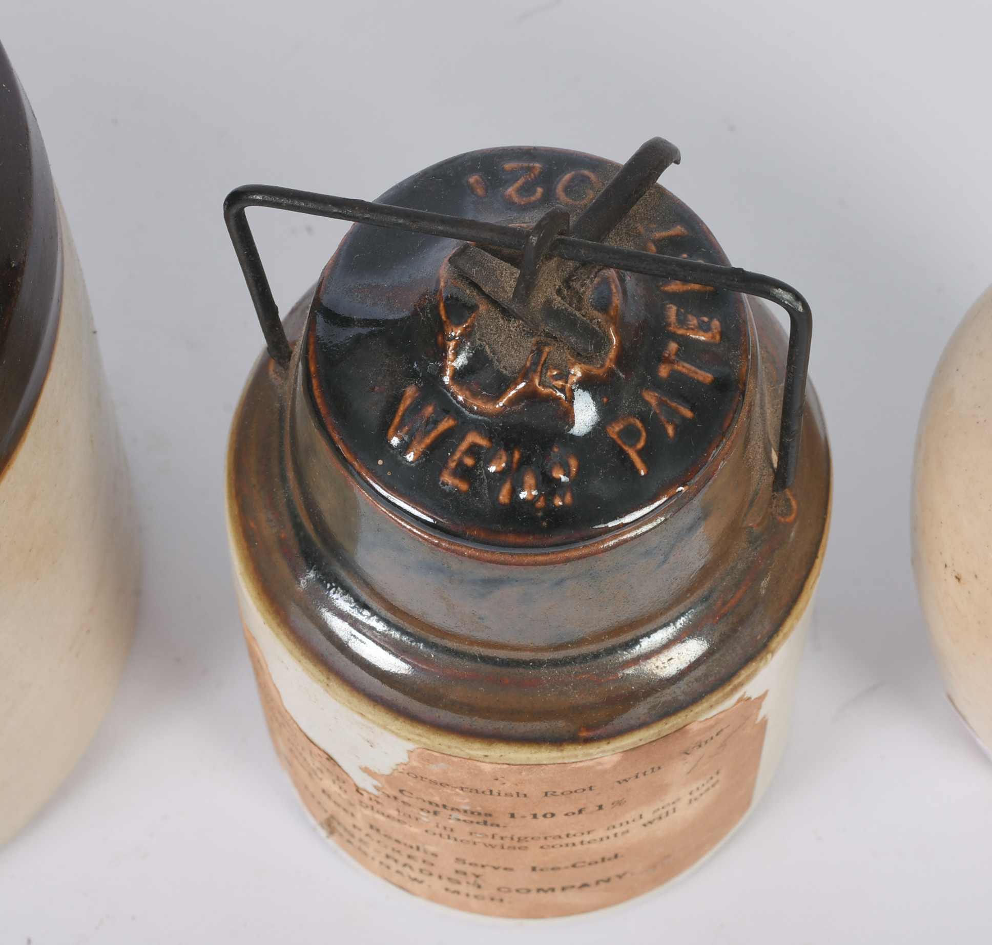 Five Small Stoneware Jars, Bottles, and a Jug.