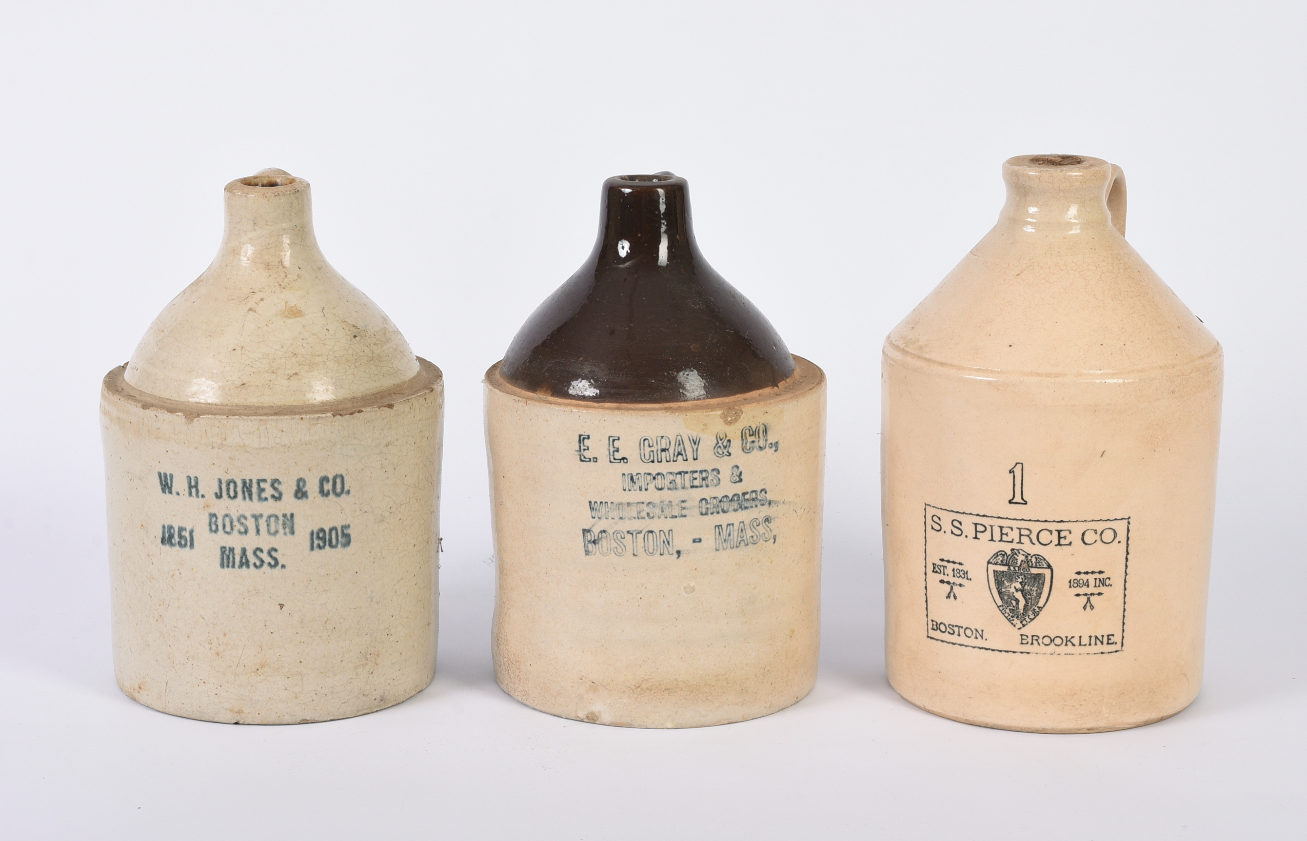 Three Advertising Stoneware Jugs.