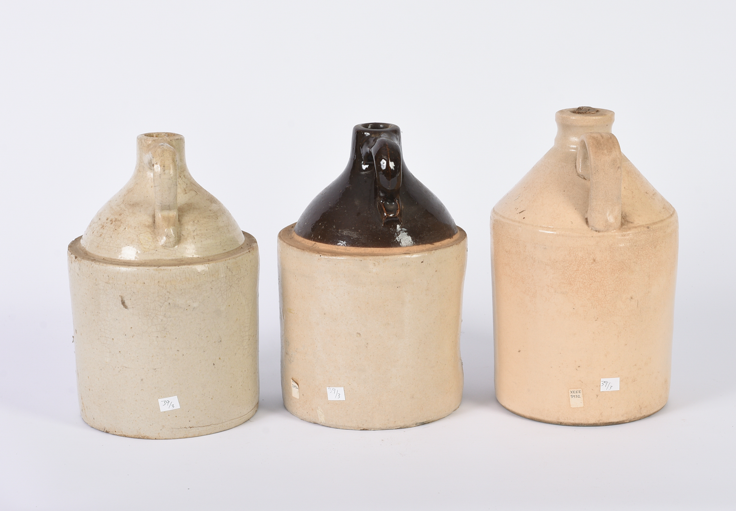 Three Advertising Stoneware Jugs.