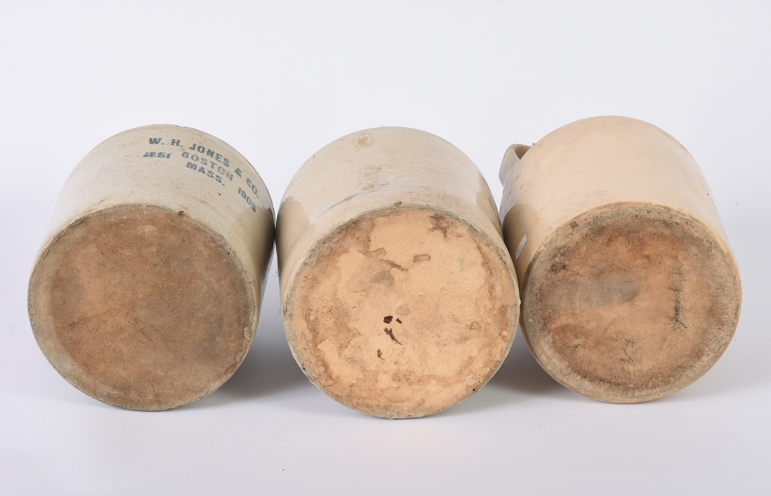 Three Advertising Stoneware Jugs.