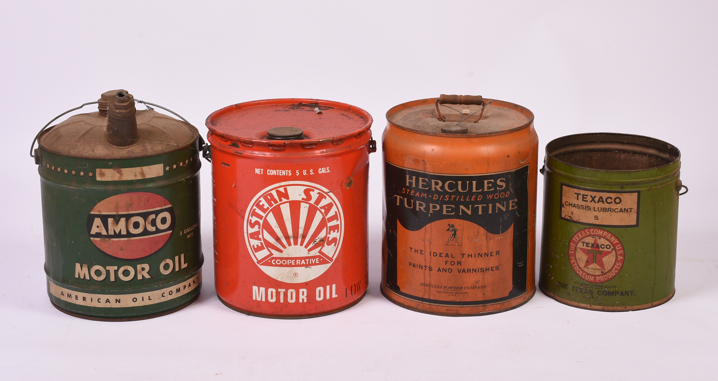 Four Large Advertising Cans.