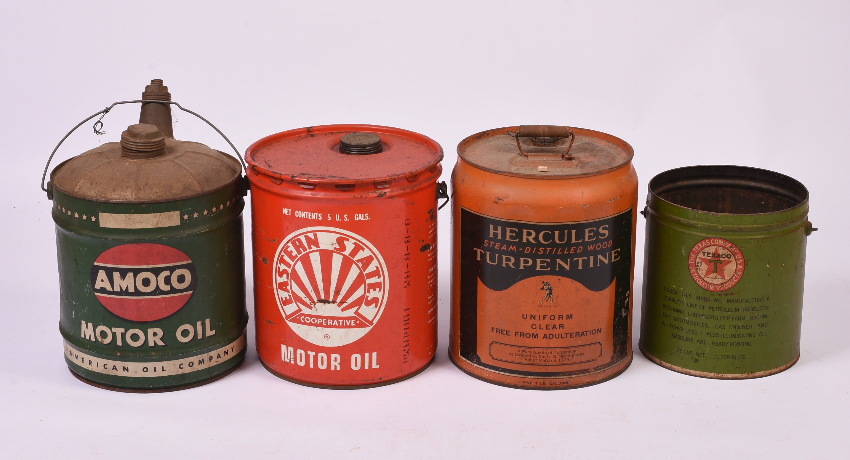 Four Large Advertising Cans.