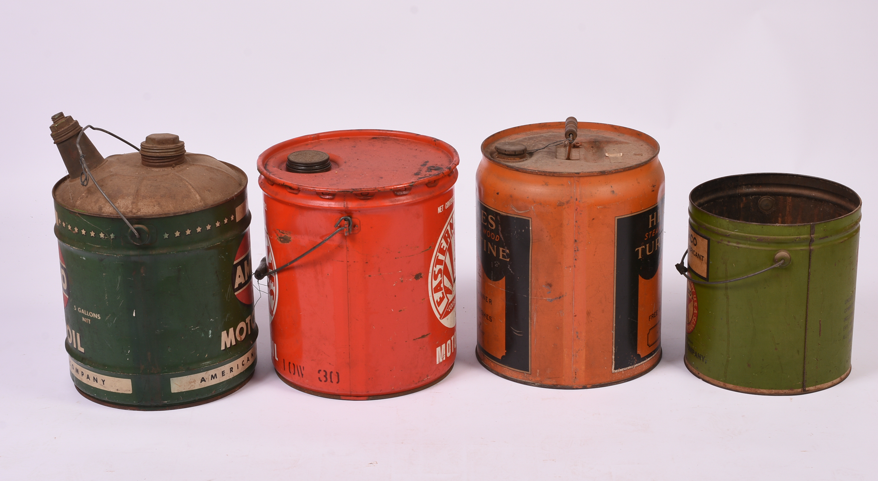 Four Large Advertising Cans.