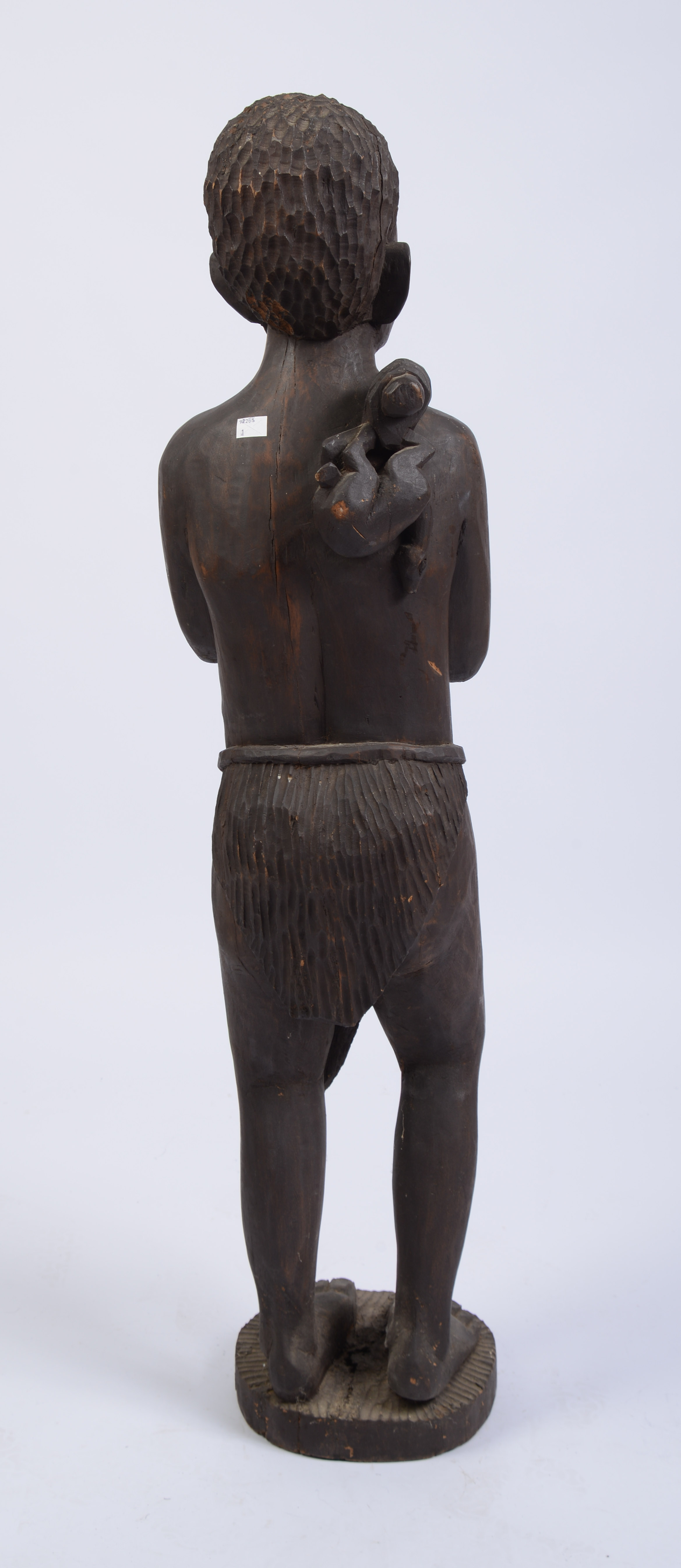 African Carved Sculpture of a Boy.