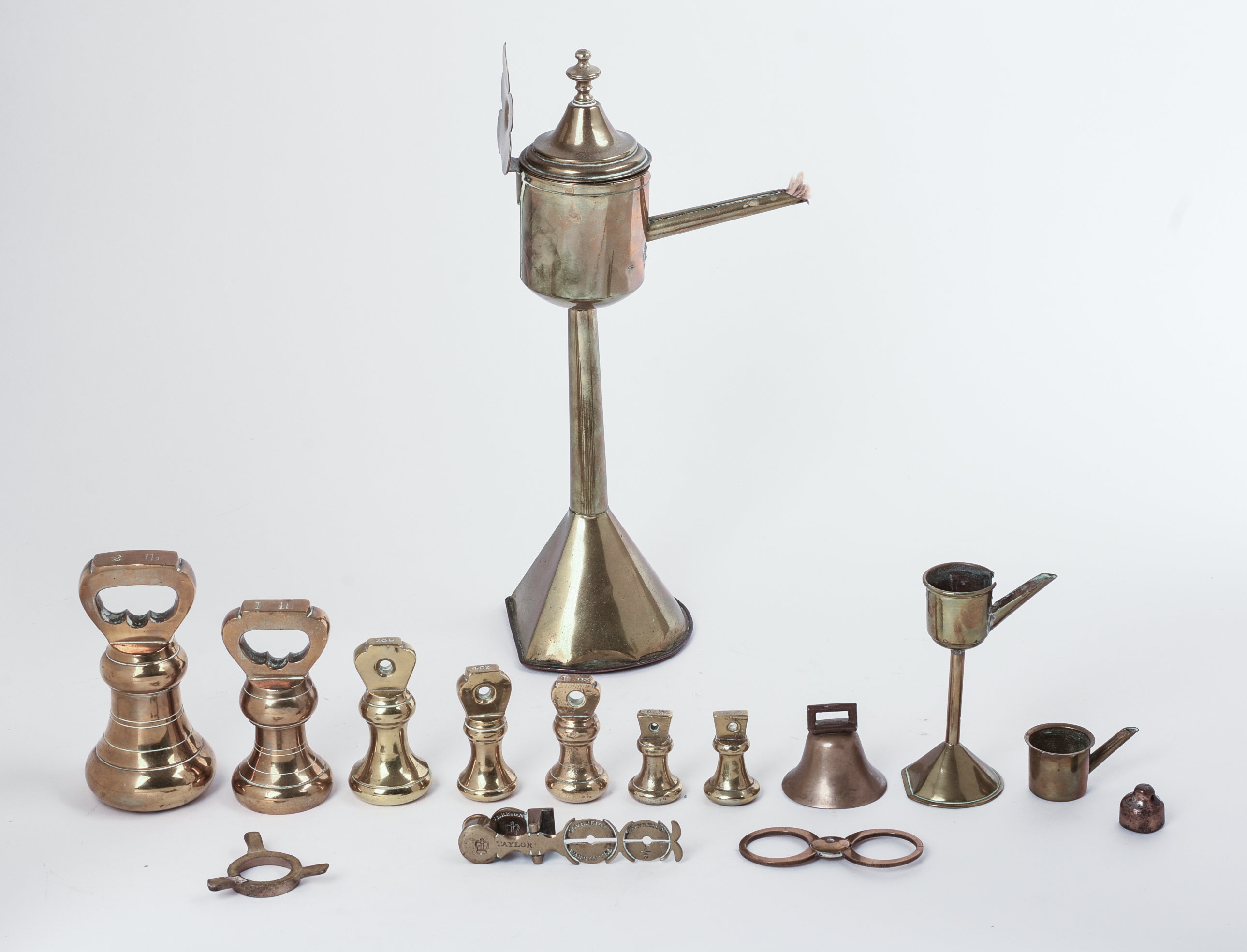 Set of Brass Weights and an Oil Lamp.