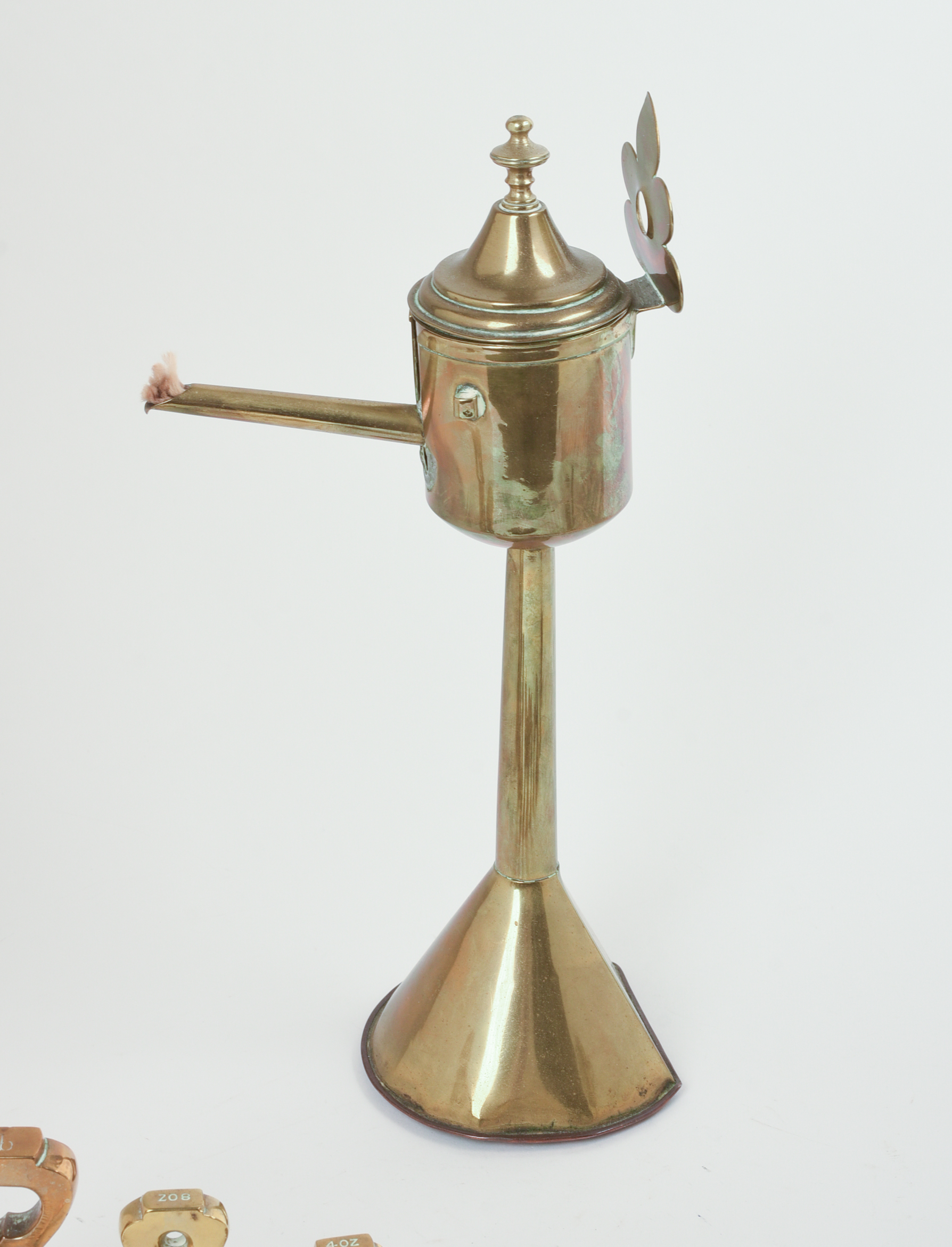 Set of Brass Weights and an Oil Lamp.