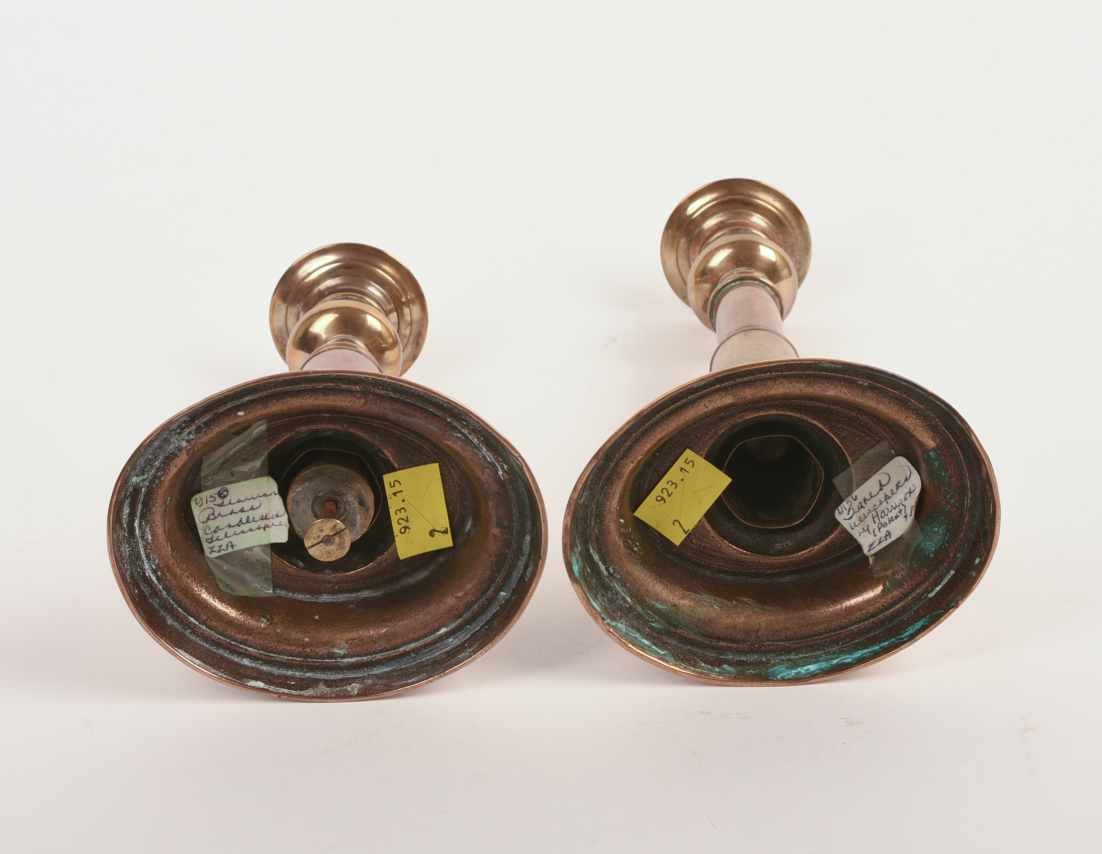 Pair of Unusual Brass Telescoping Push Up Candlesticks.