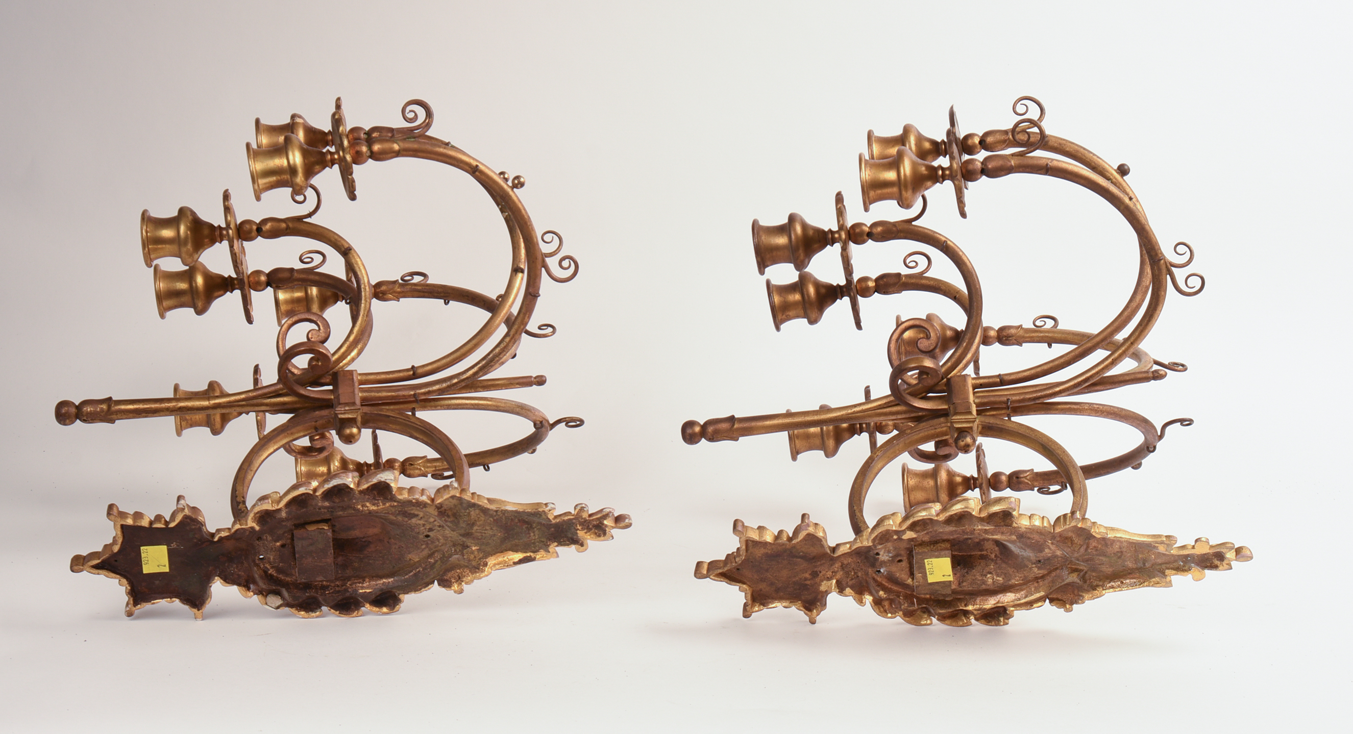 Pair of Ornate Gilt Metal Seven Light Wall Sconces.