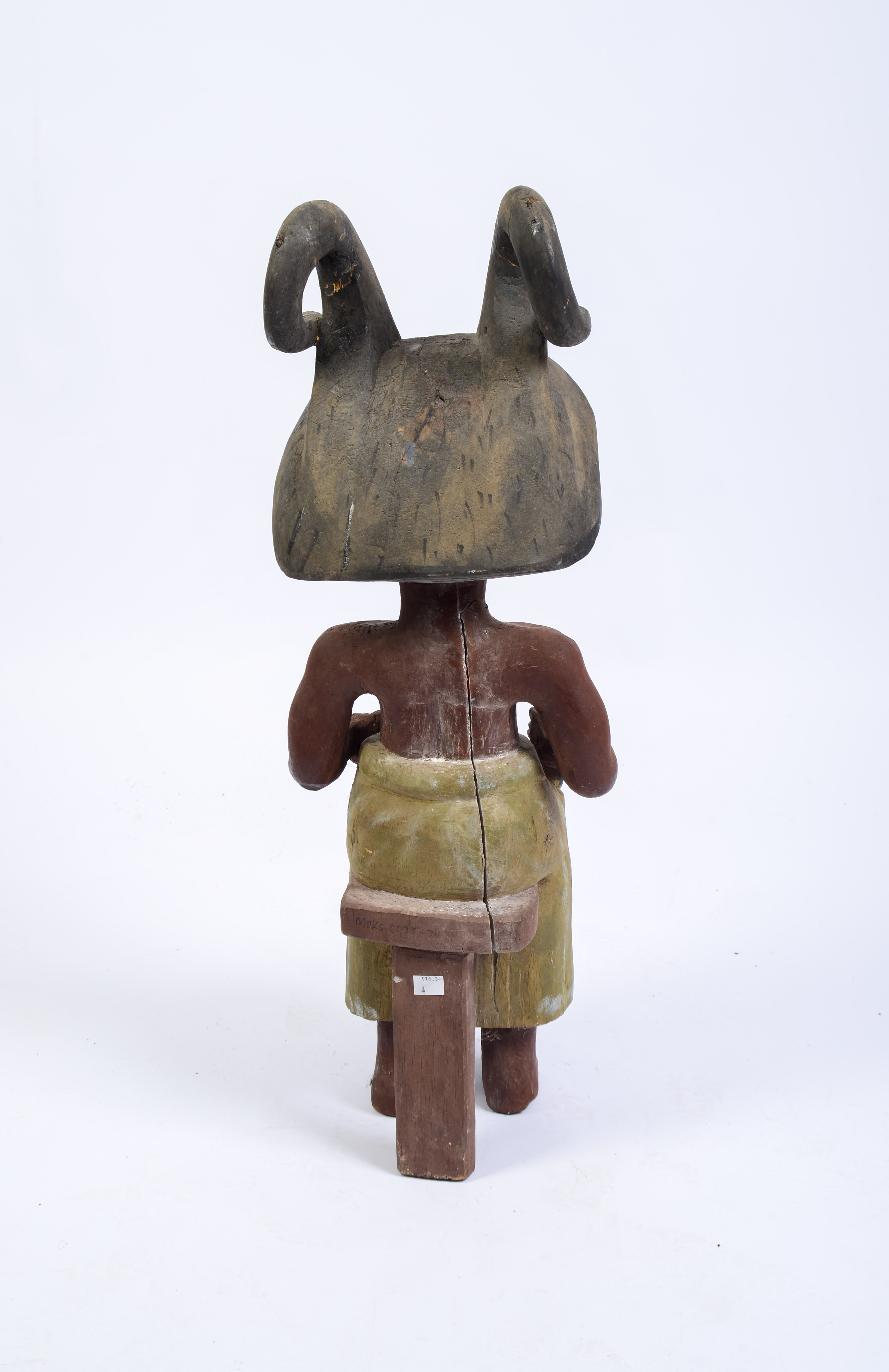 African Carved Figure of a Seated Man.