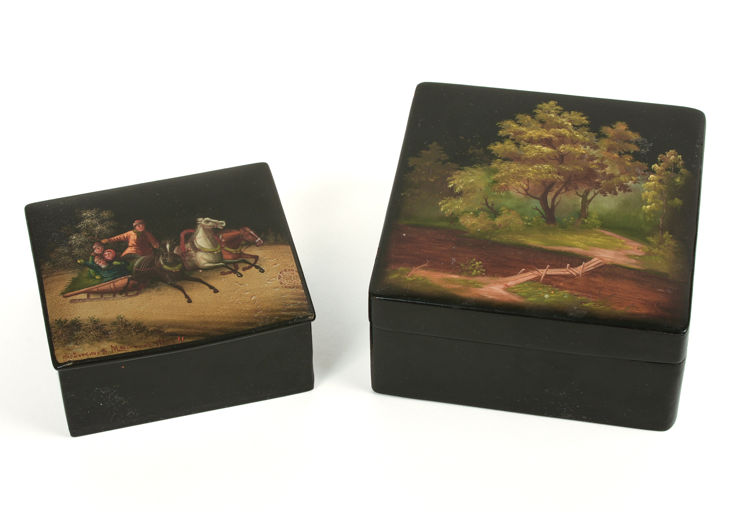 Two Russian Lacquer Boxes. Both signed.