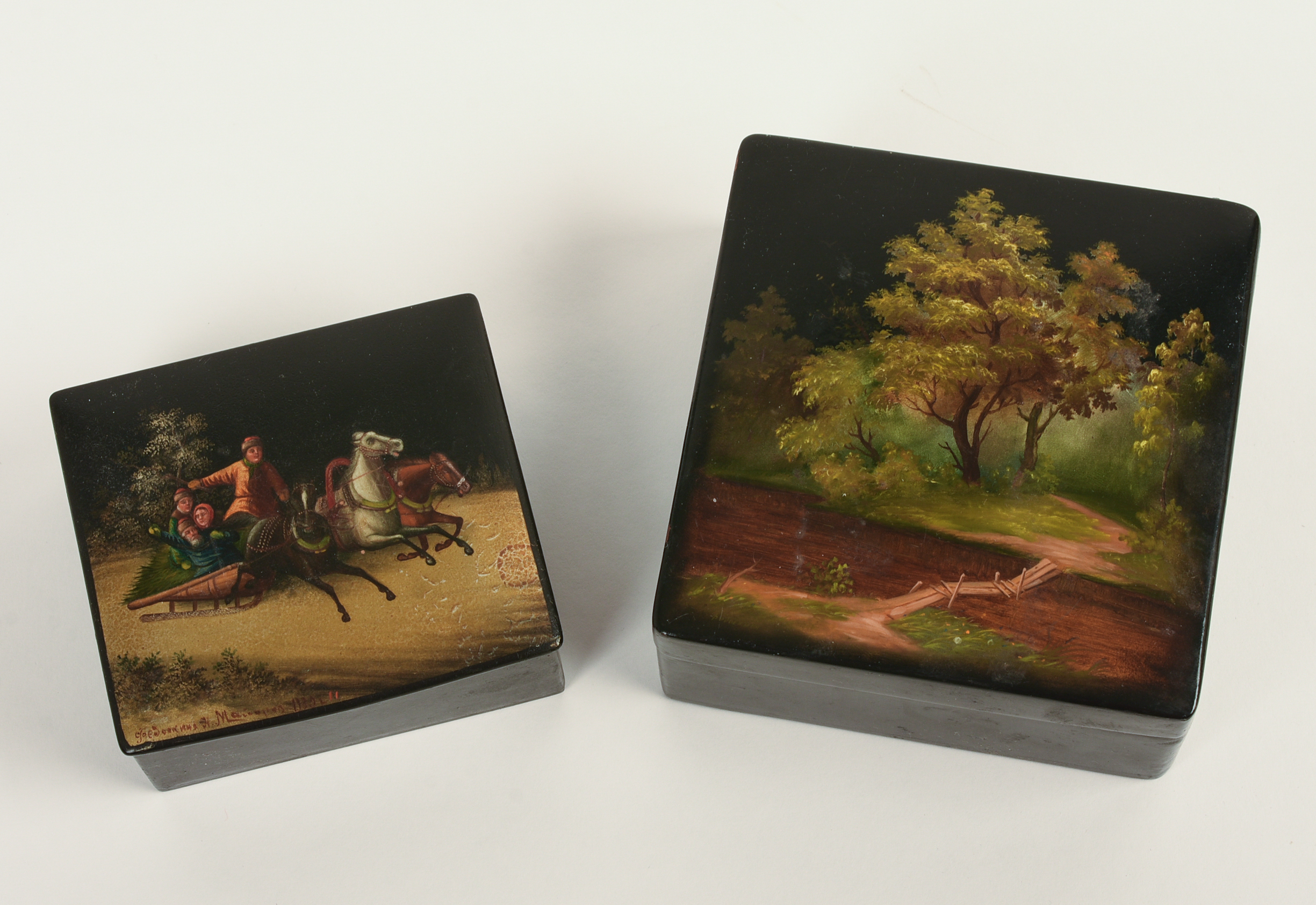 Two Russian Lacquer Boxes. Both signed.