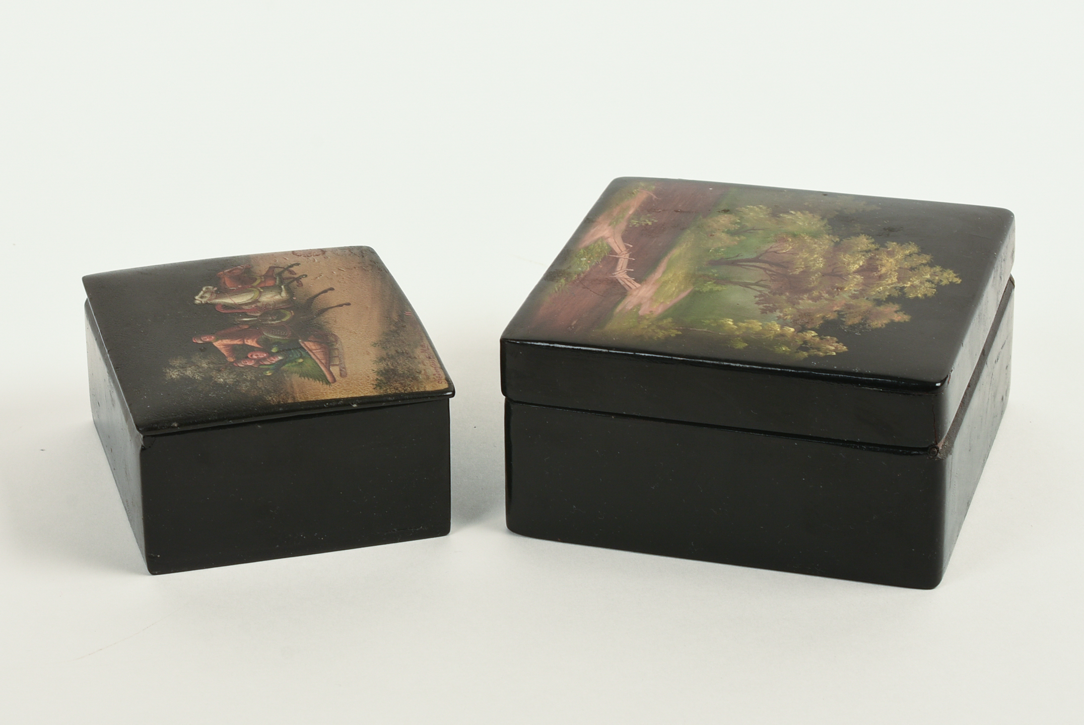 Two Russian Lacquer Boxes. Both signed.