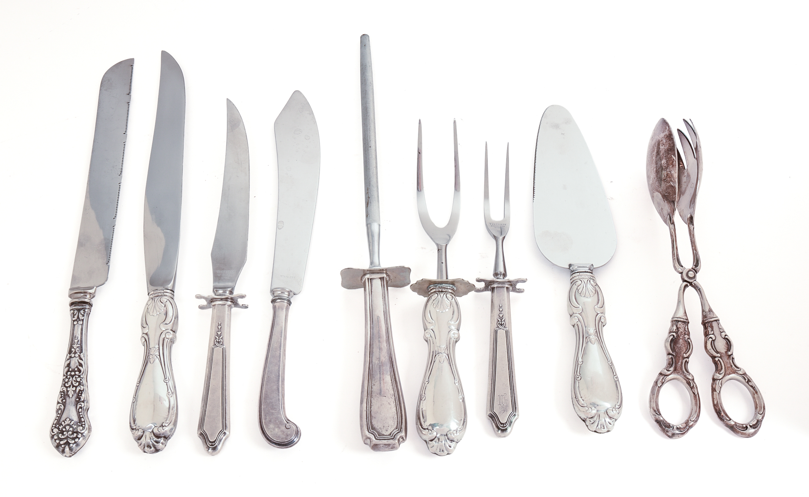 Nine Antique Sterling Handled Serving Utensils and Knives