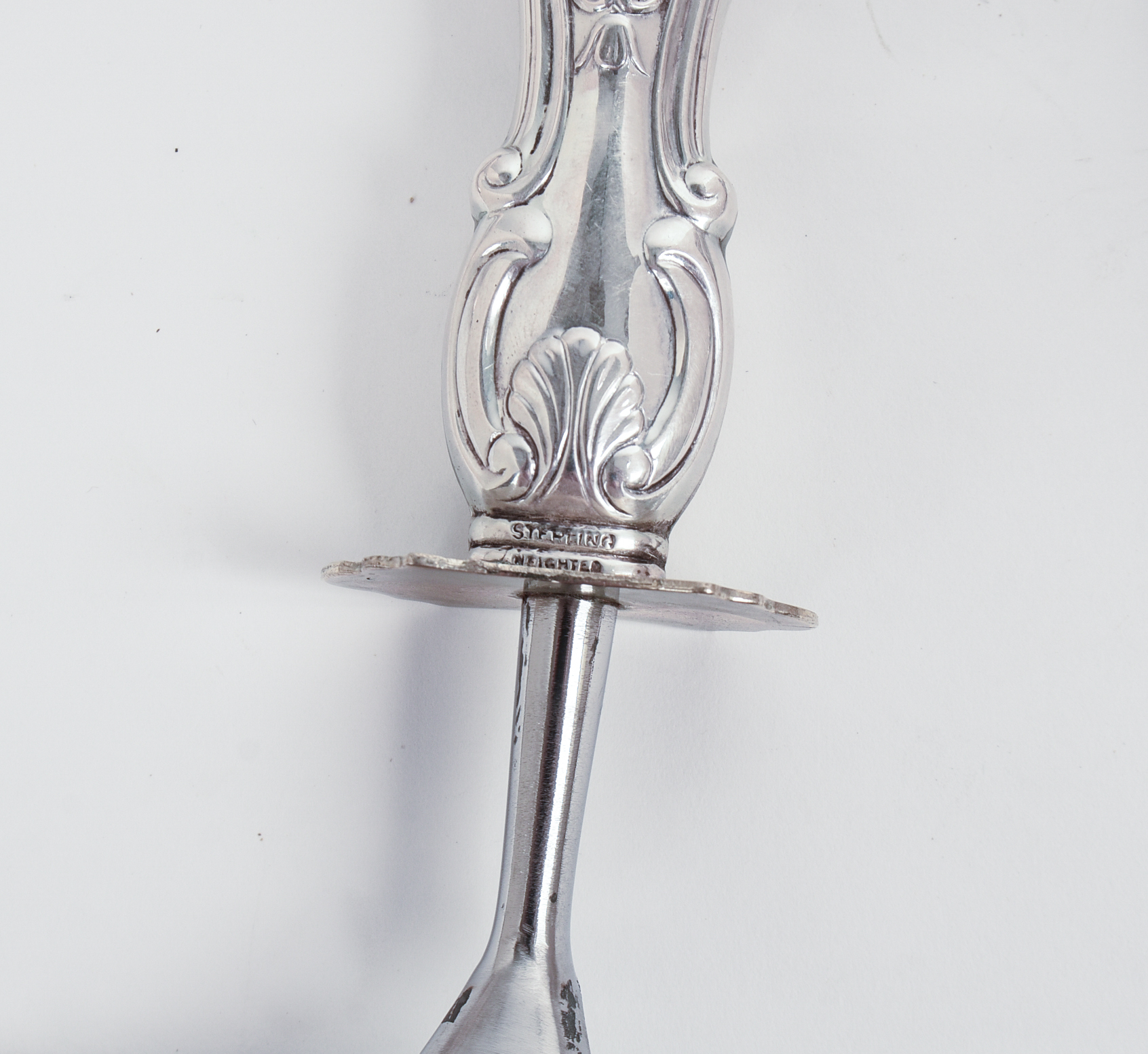Nine Antique Sterling Handled Serving Utensils and Knives