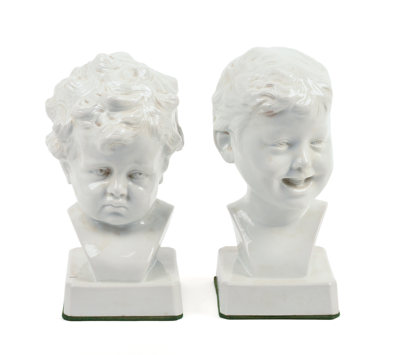 Pair of Signed Continental White Porcelain Busts of Boys