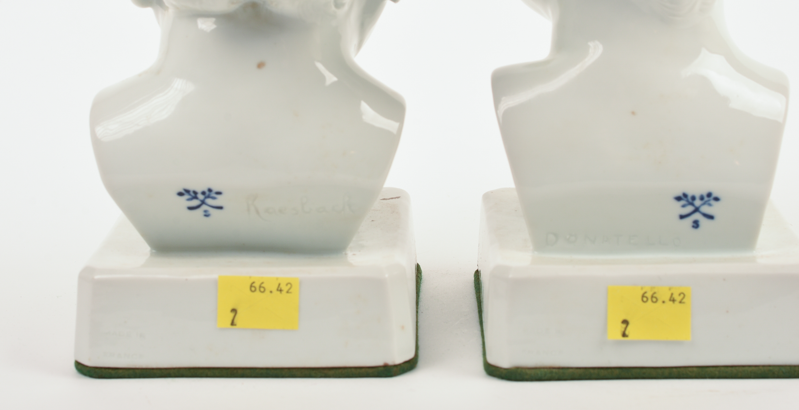 Pair of Signed Continental White Porcelain Busts of Boys