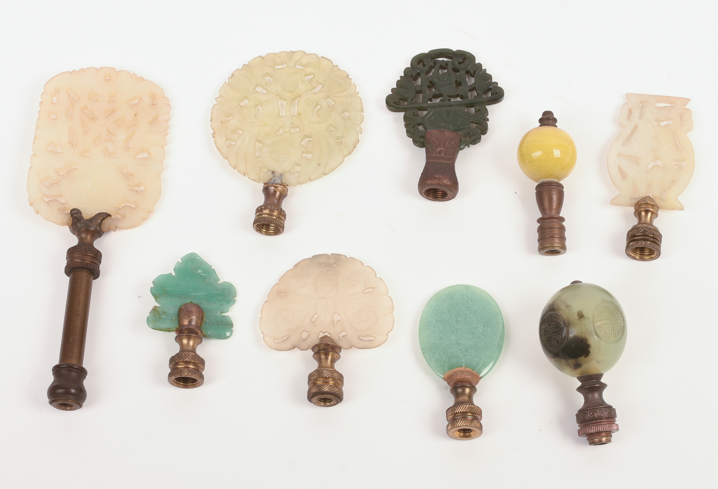 Nine Chinese Carved Jade, Stone and Glass Lamp Finials