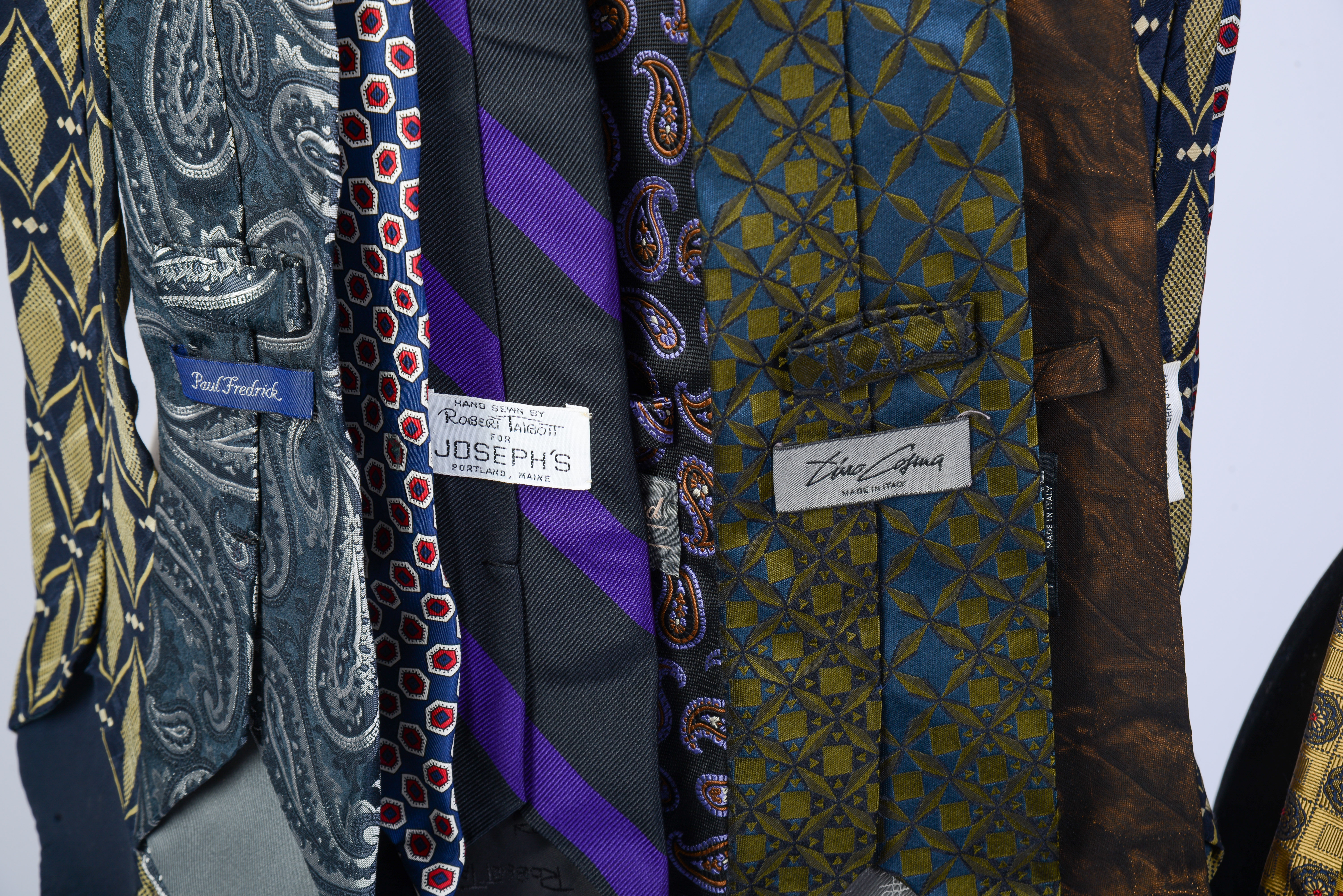 TWELVE DESIGNER TIES.