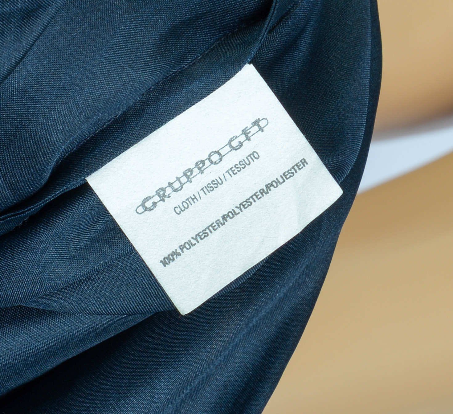 GROUP OF DESIGNER CLOTHING.