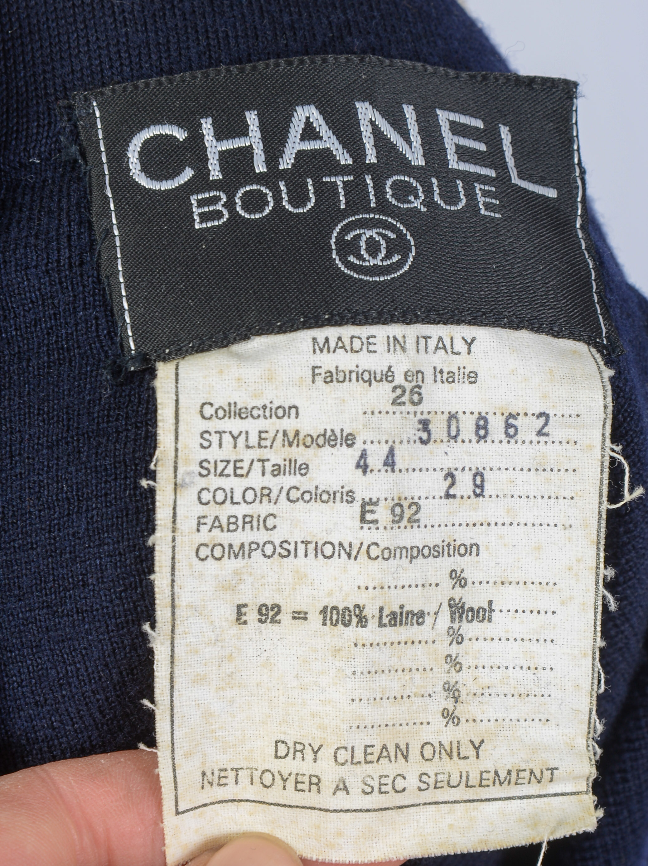 CHANEL BOUTIQUE WOOL SKIRT, SIZE 44.