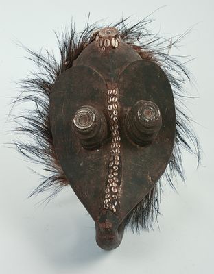 AFRICAN CARVED WOODEN MASK. 13 x 7 x 6 inches.