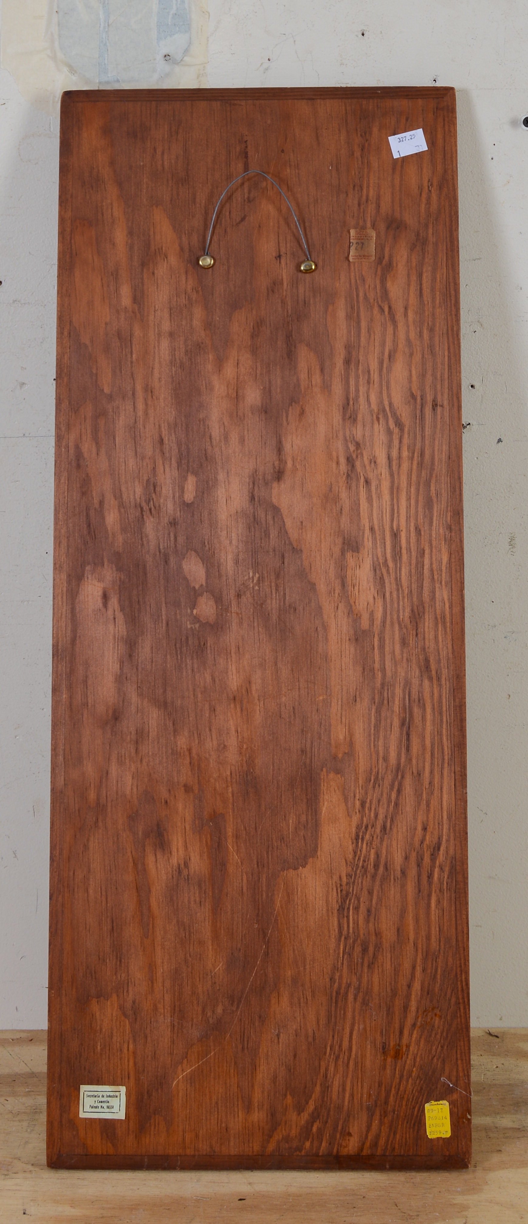 STONE AND WOOD WALL PLAQUE.