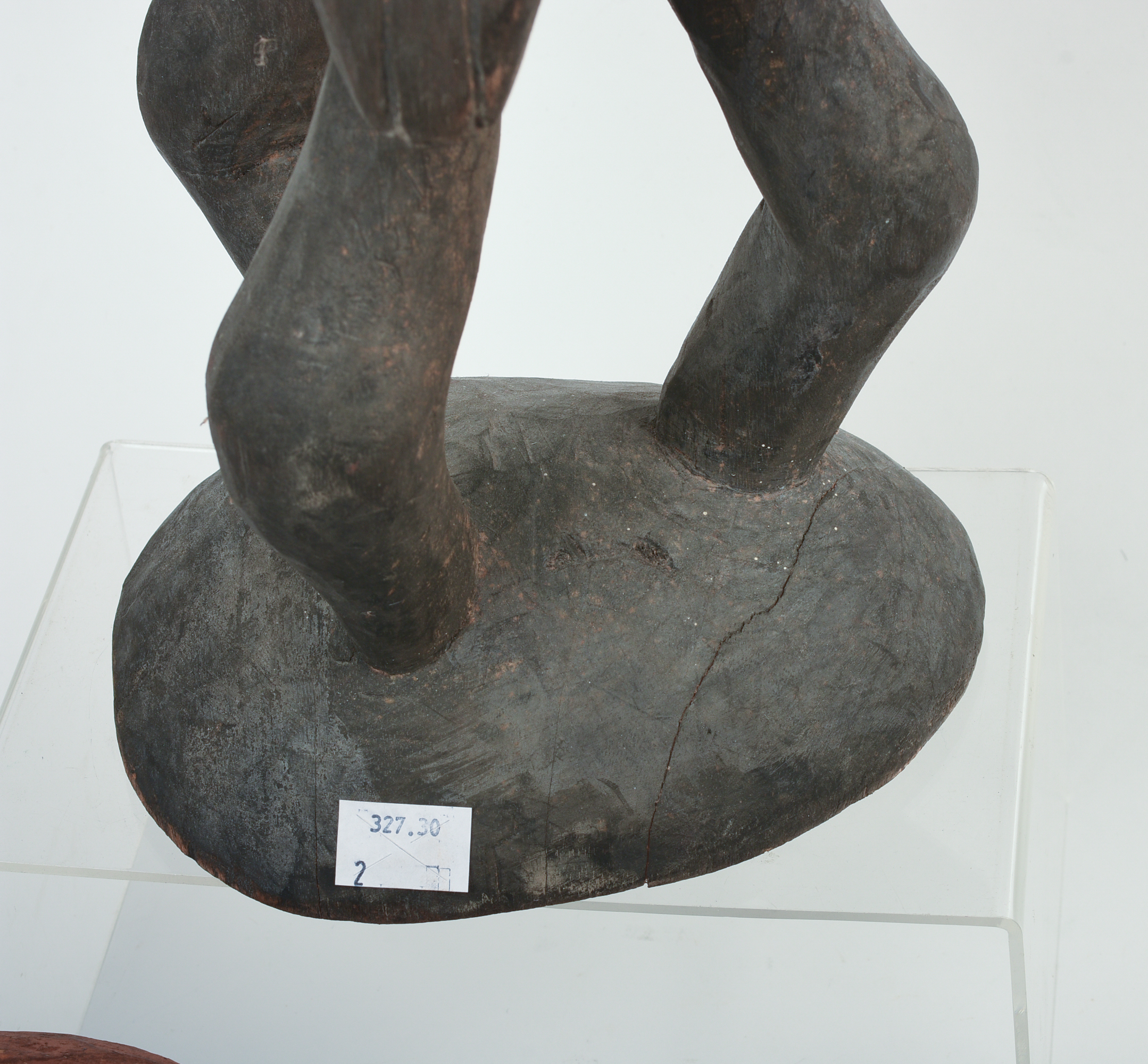 TWO AFRICAN CARVED WOODEN SCULPTURES.