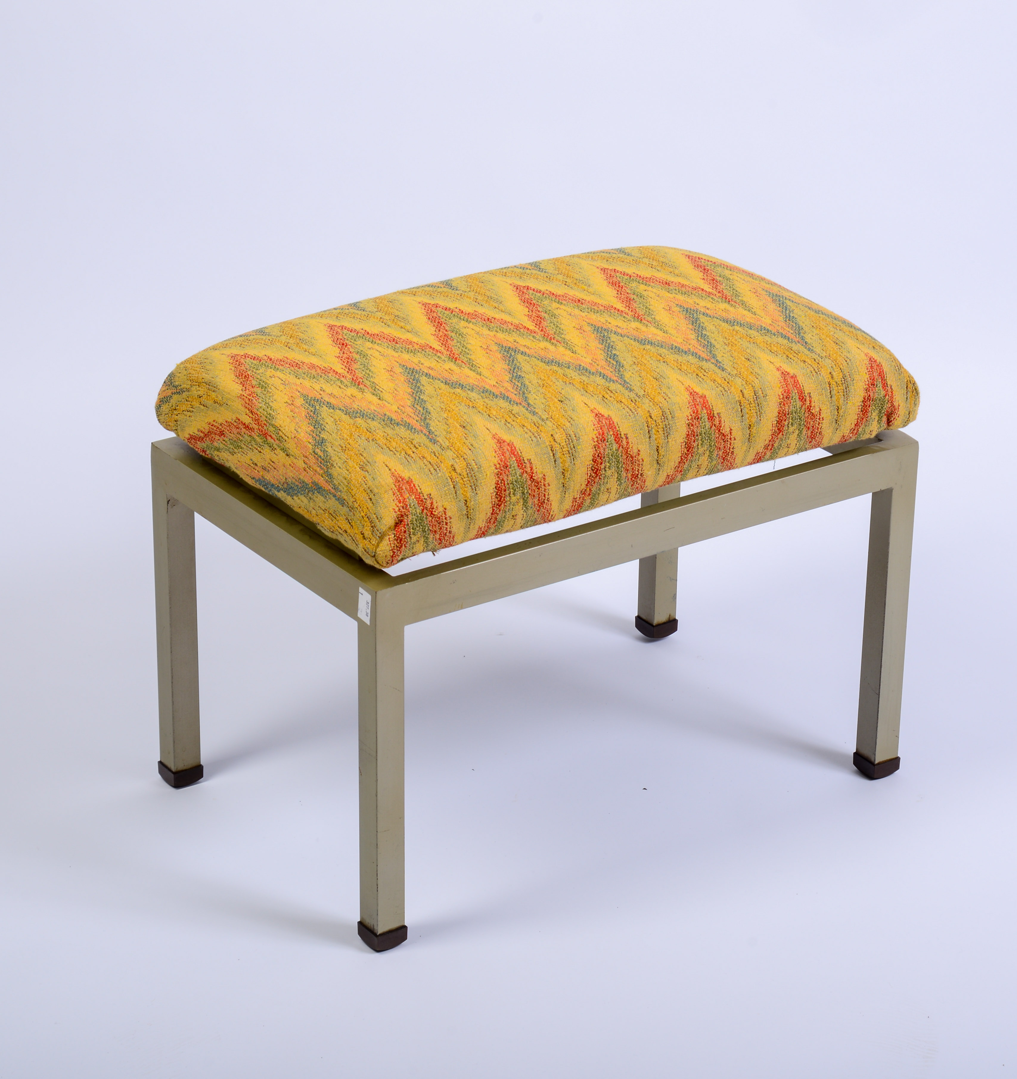 METAL FOOTSTOOL WITH NEEDLEPOINT SEAT.