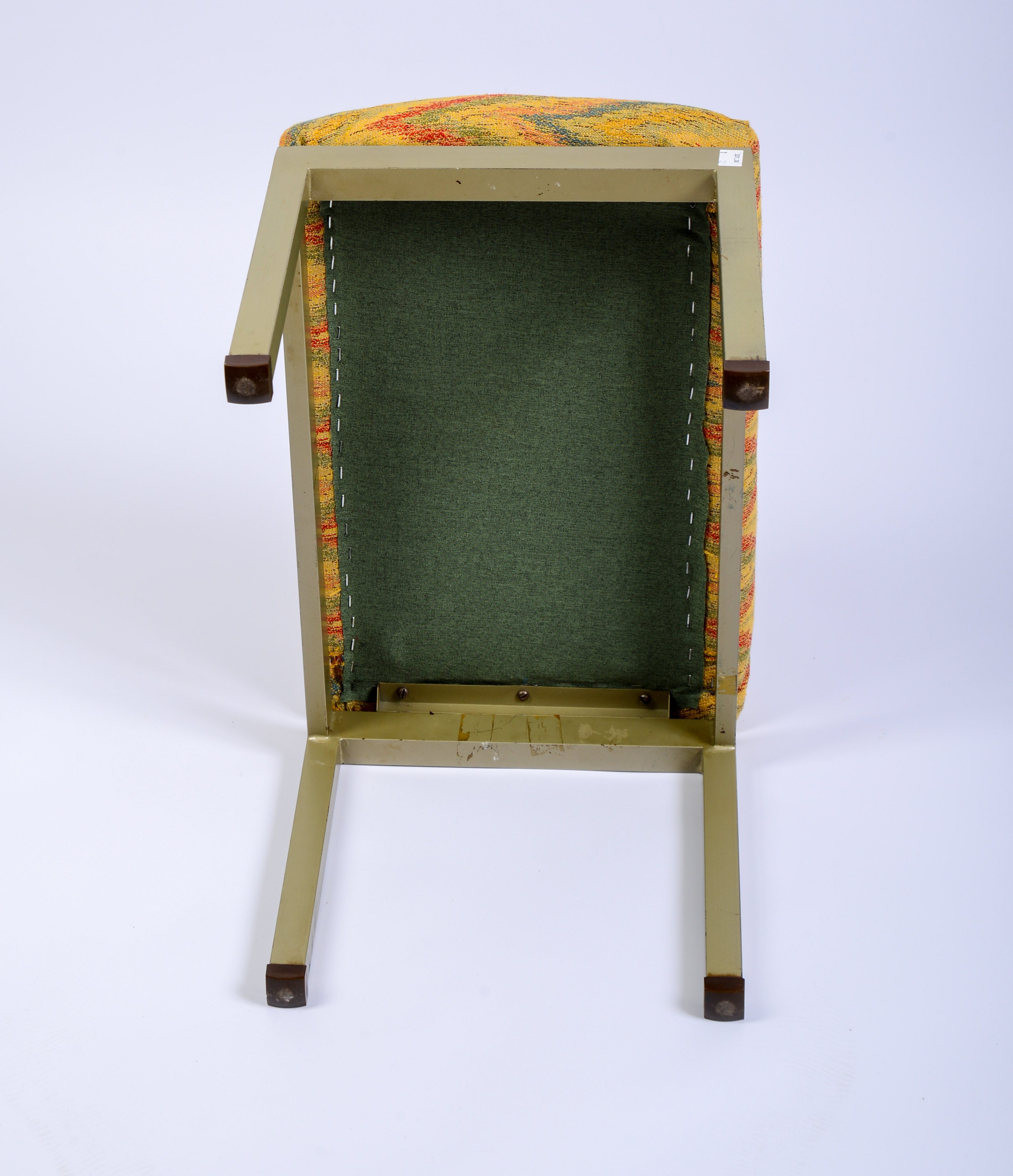 METAL FOOTSTOOL WITH NEEDLEPOINT SEAT.