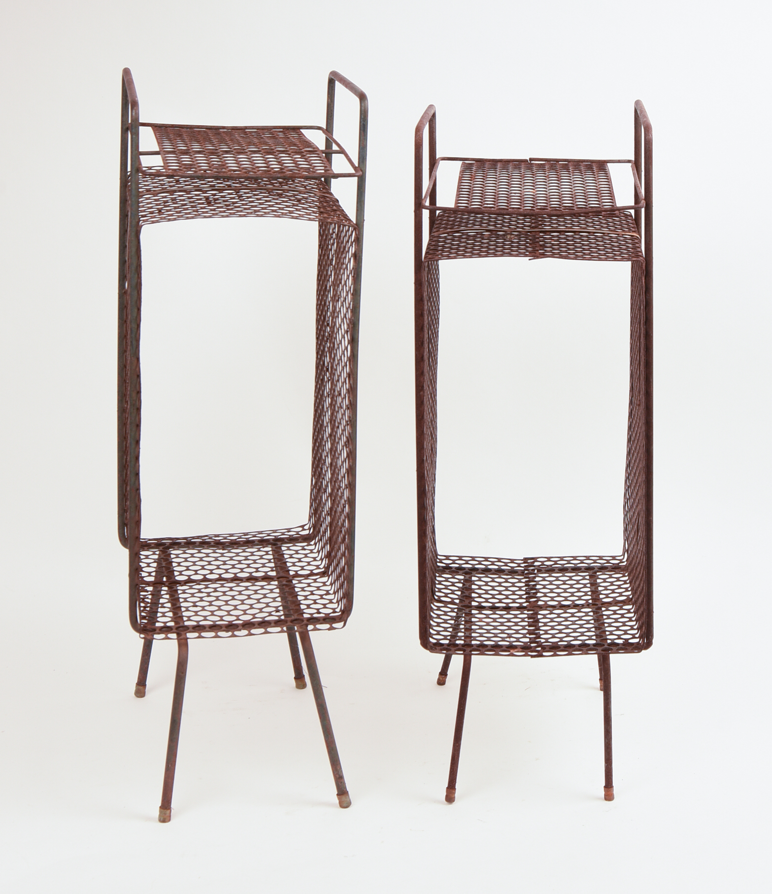 PAIR OF METAL MAGAZINE RACKS.