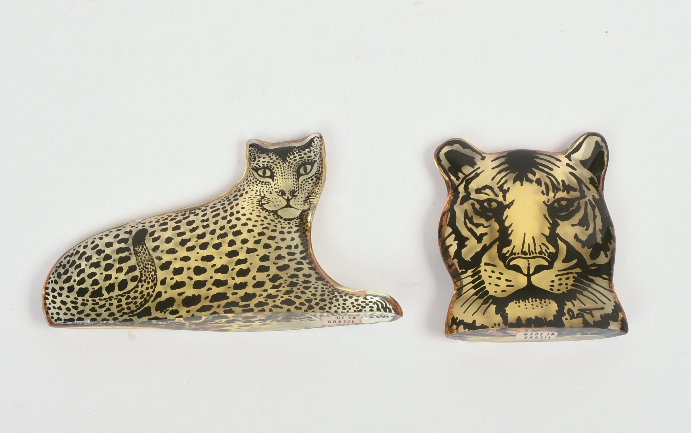 TWO LUCITE BIG CATS BY ABRAHAM PALATNIK.