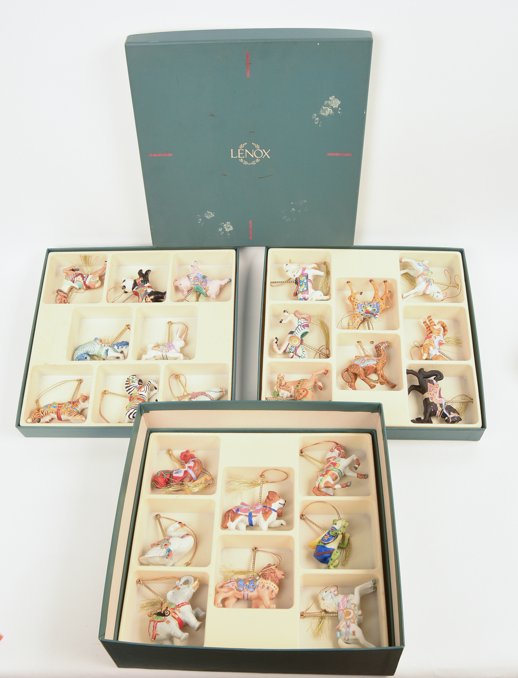 TWENTY FOUR LENOX CAROUSEL ANIMAL CHRISTMAS ORNAMENTS.