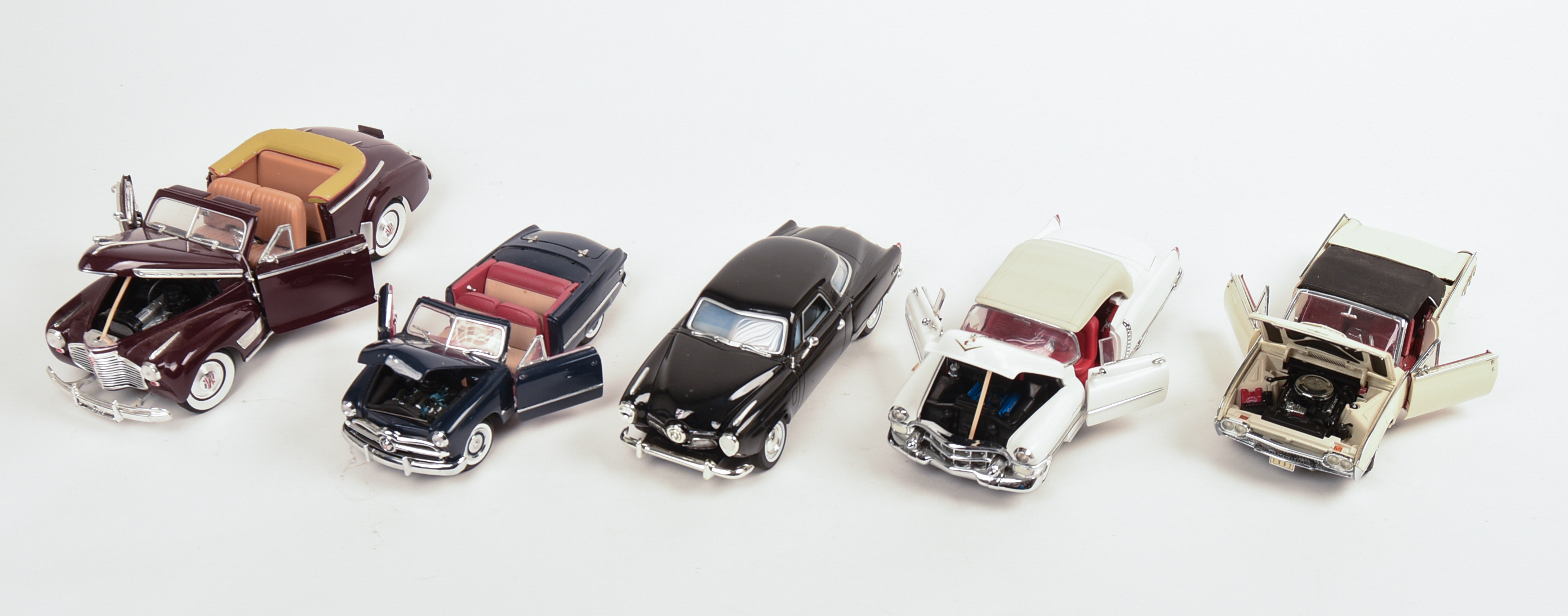 Five Diecast Model Cars.