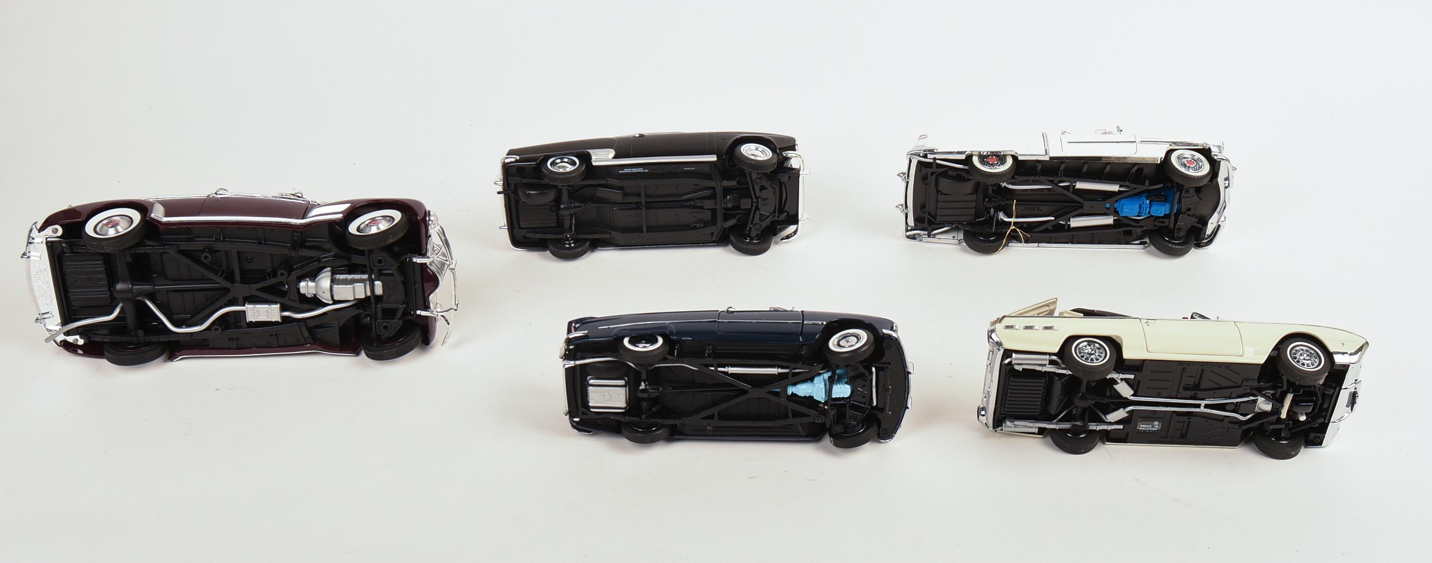Five Diecast Model Cars.