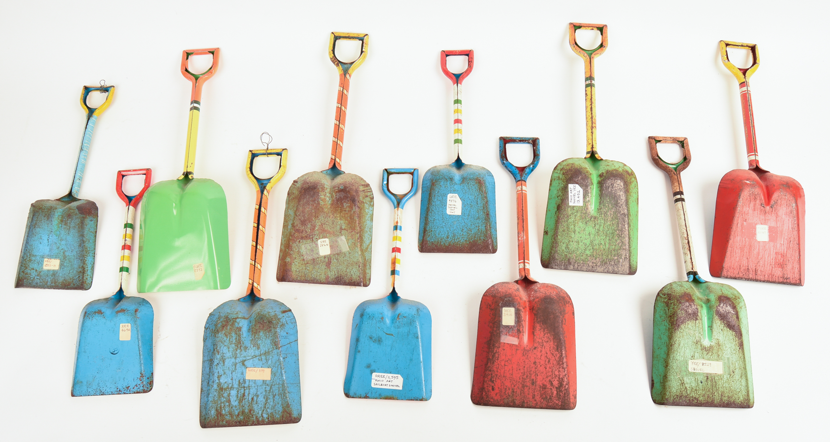 Large Collection of Tin Lithograph Shovels.