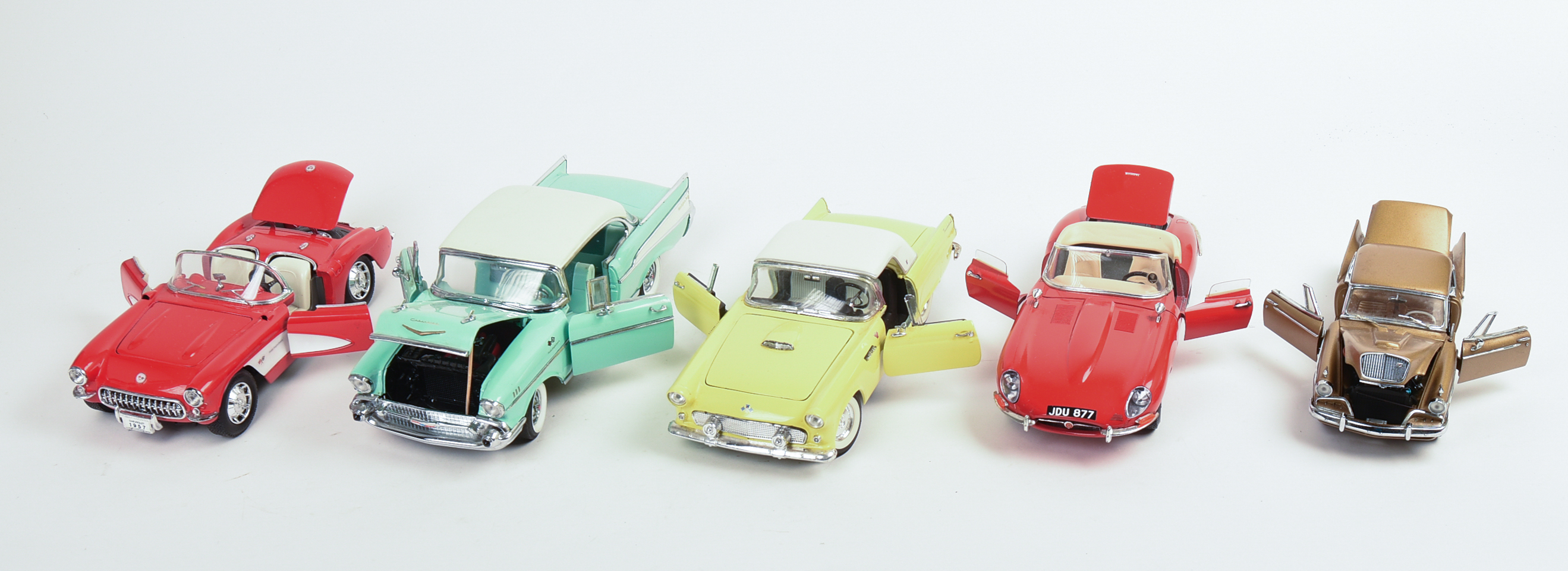 Five Diecast Model Cars.