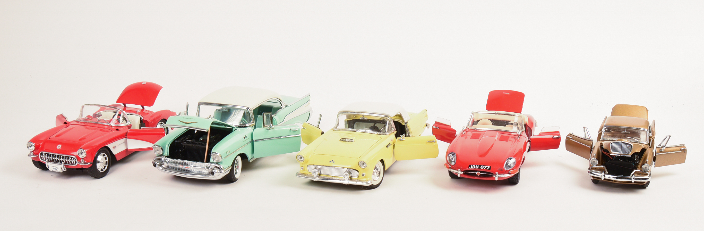 Five Diecast Model Cars.