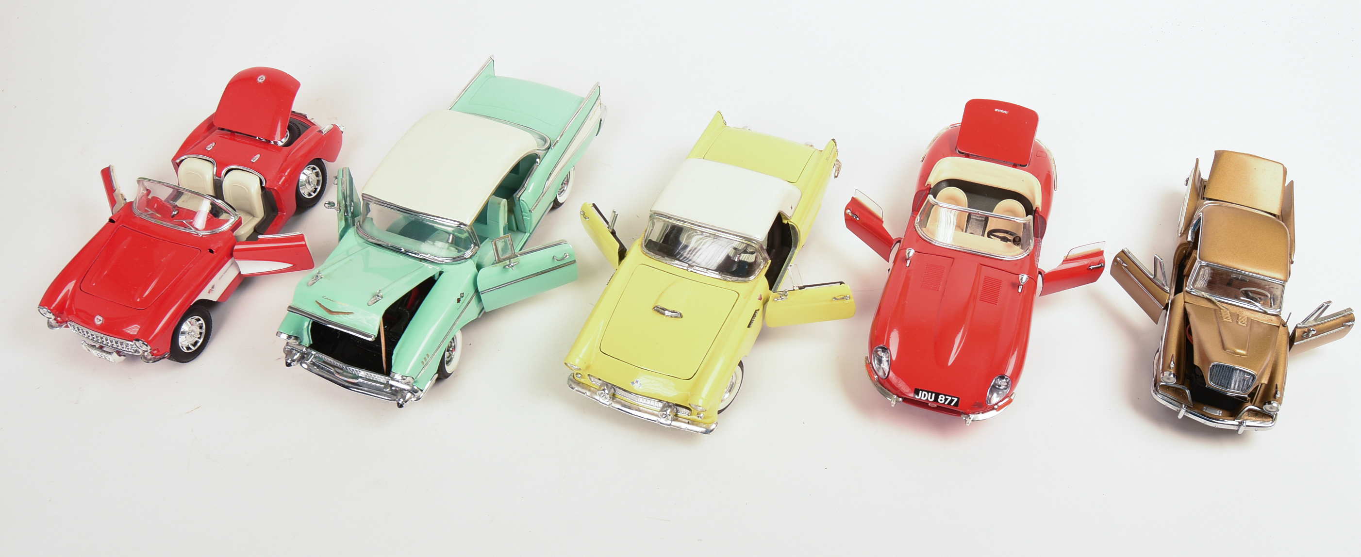 Five Diecast Model Cars.