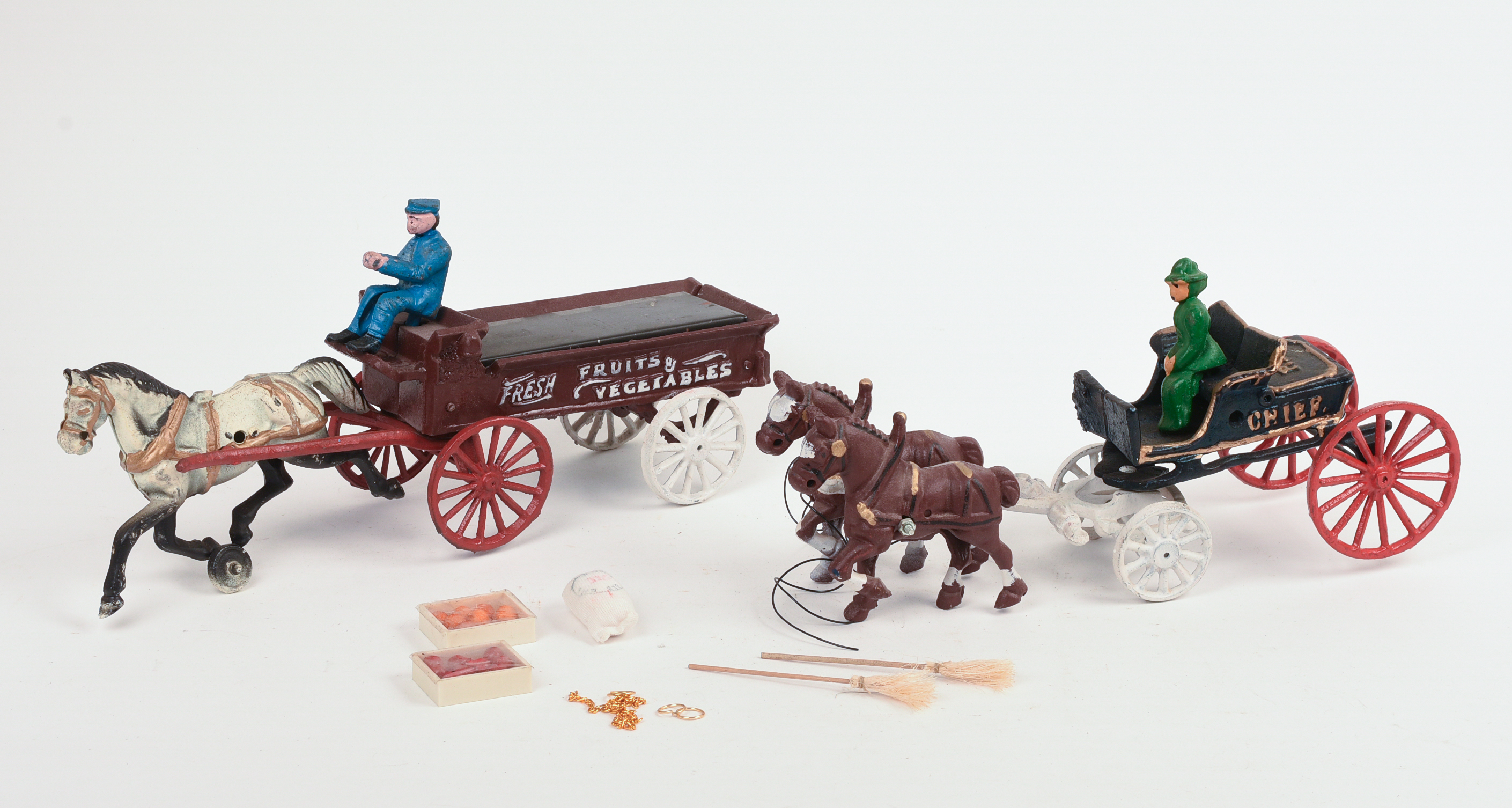 Two Cast Iron Horse Drawn Wagons.