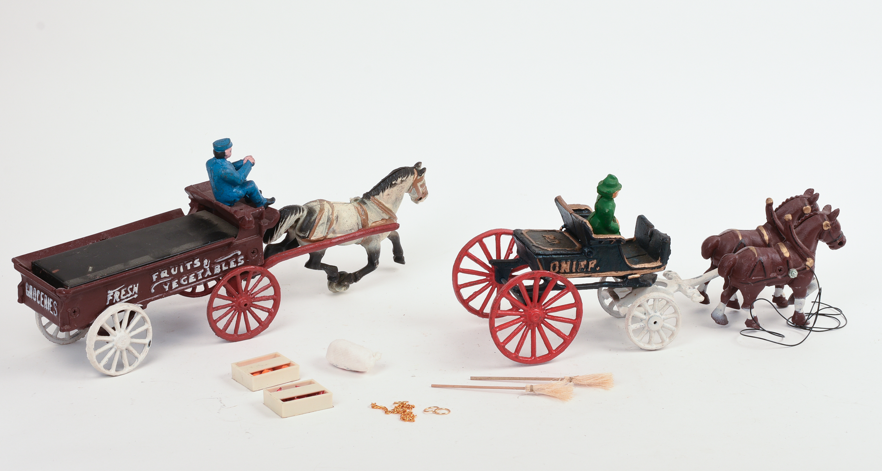 Two Cast Iron Horse Drawn Wagons.